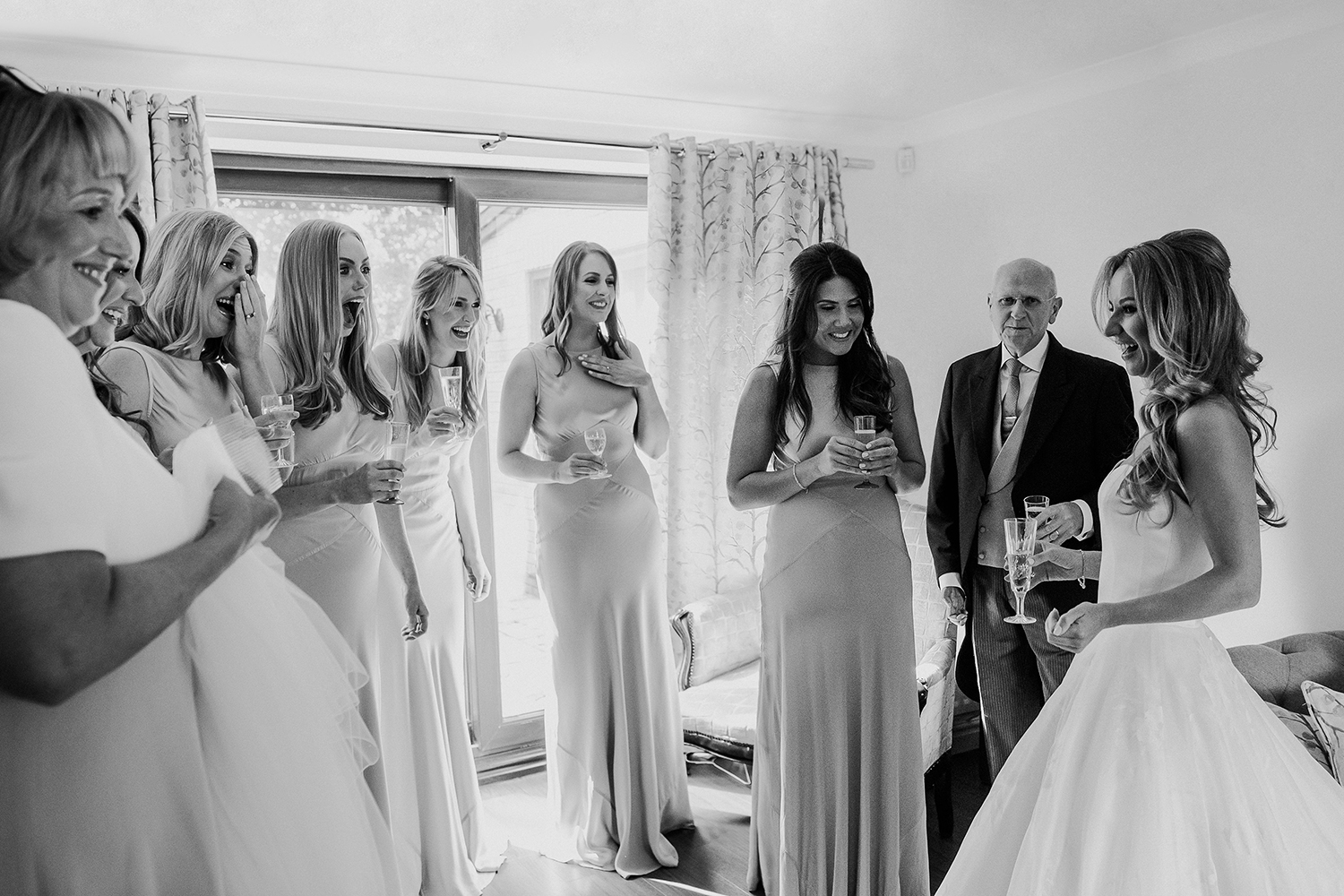  bridesmaids reaction to the bride in her dress 