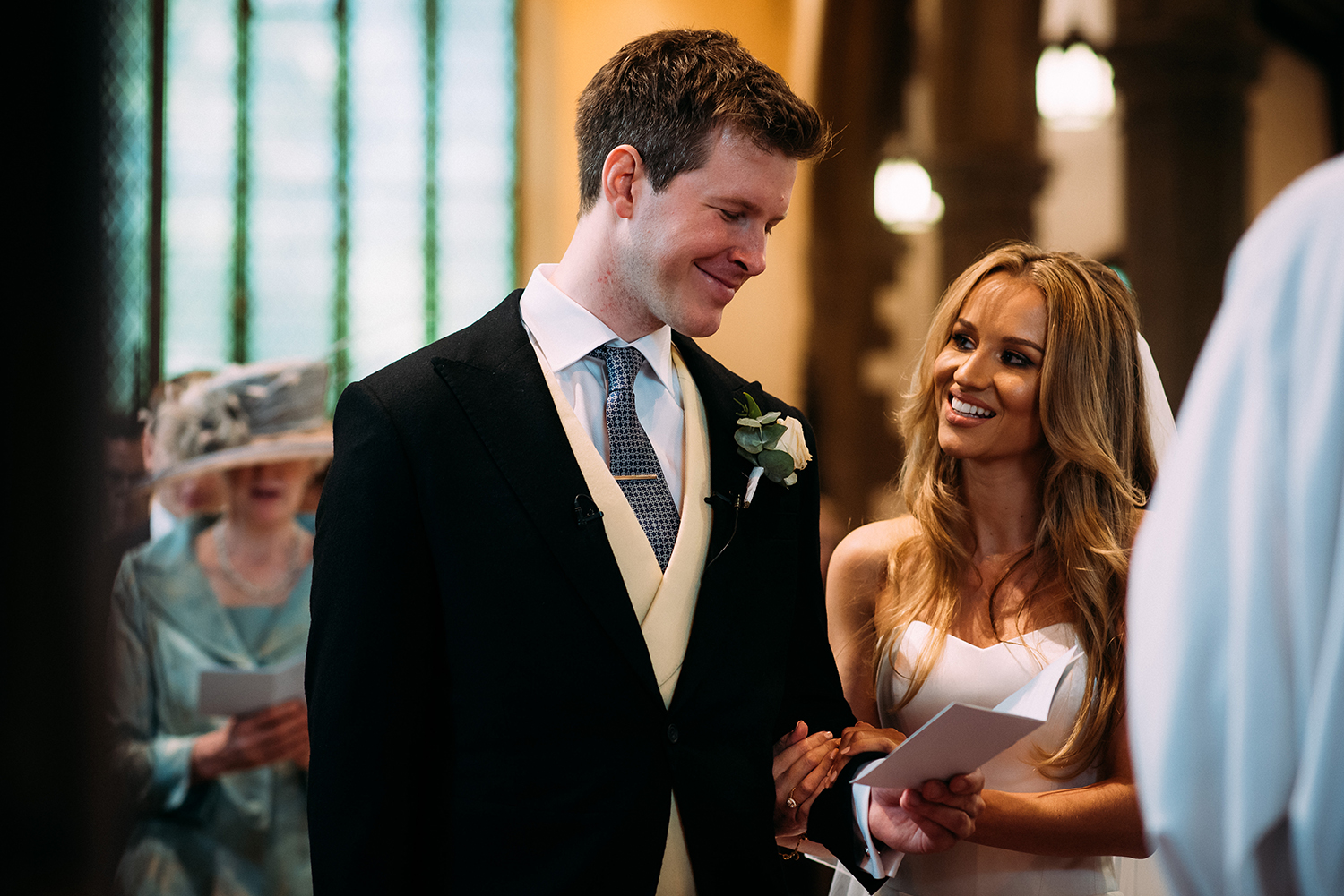 bride and groom smiling