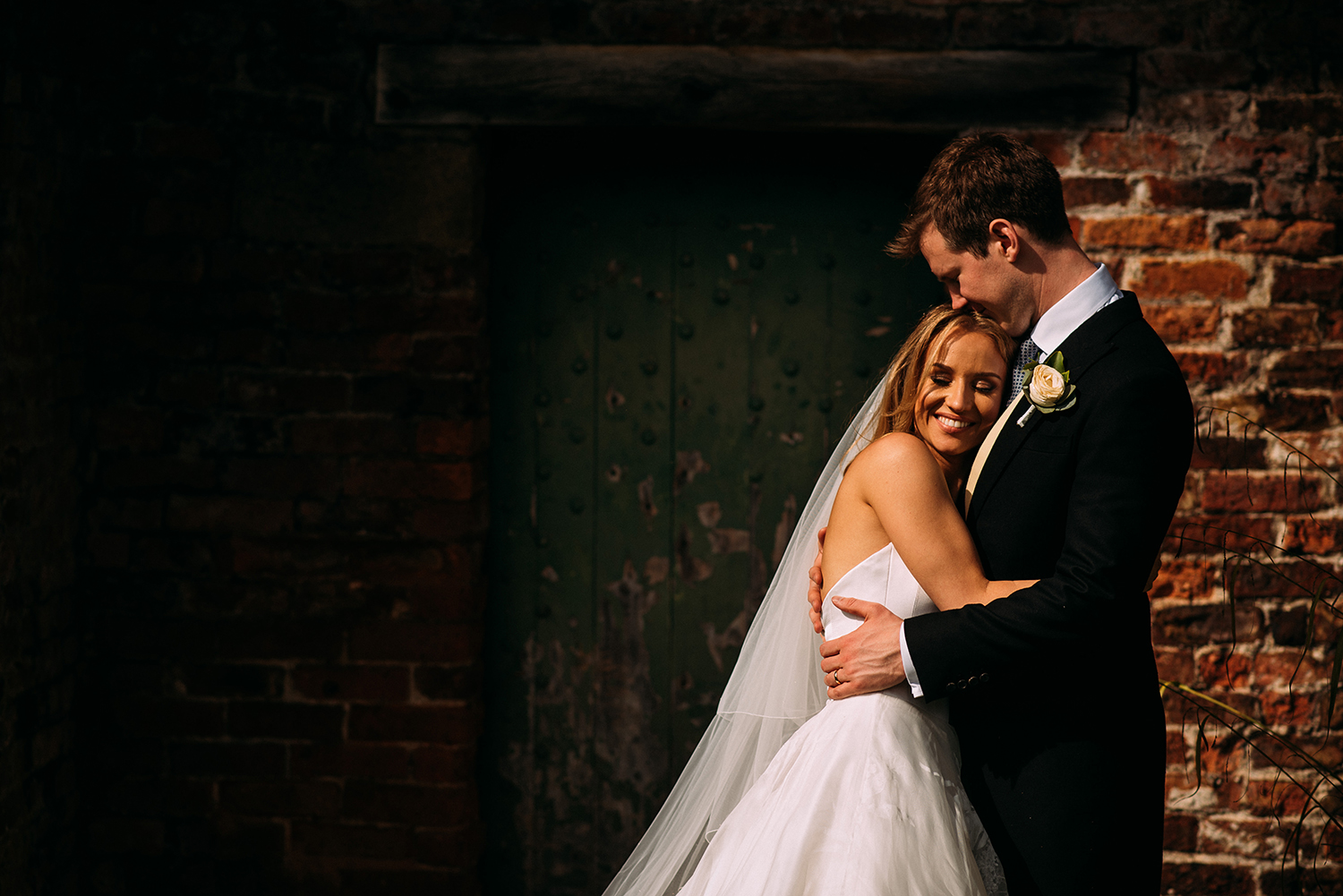 bride and groom hug