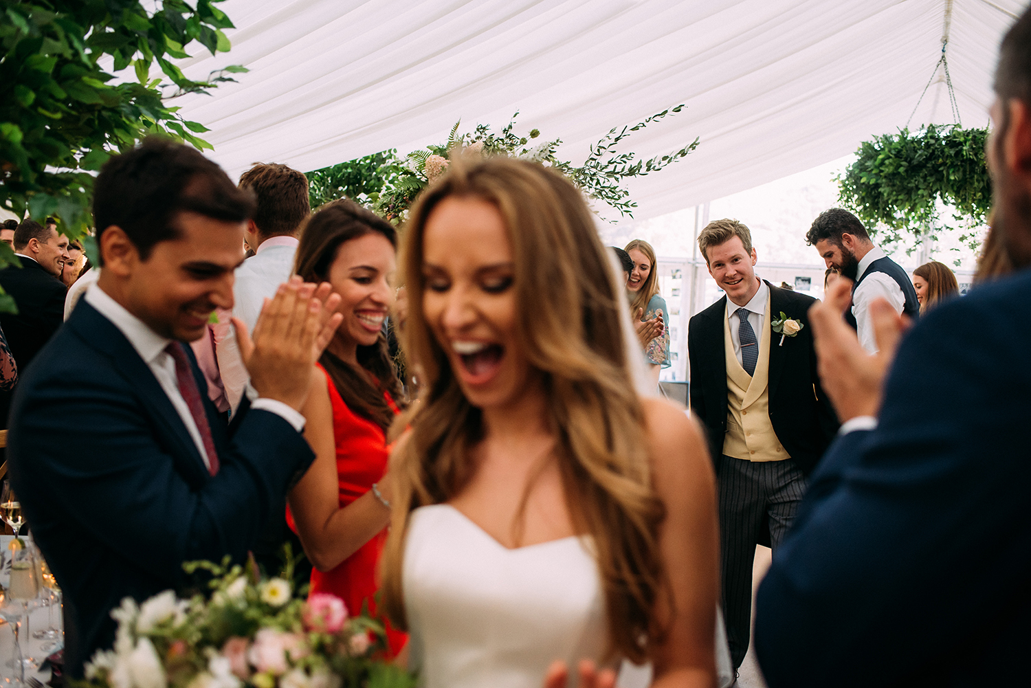 bride and groom enter the reception