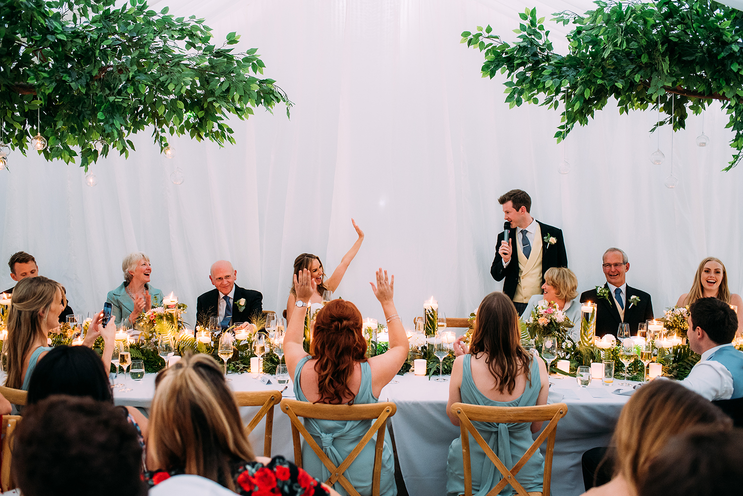 wide shot of the grooms speech