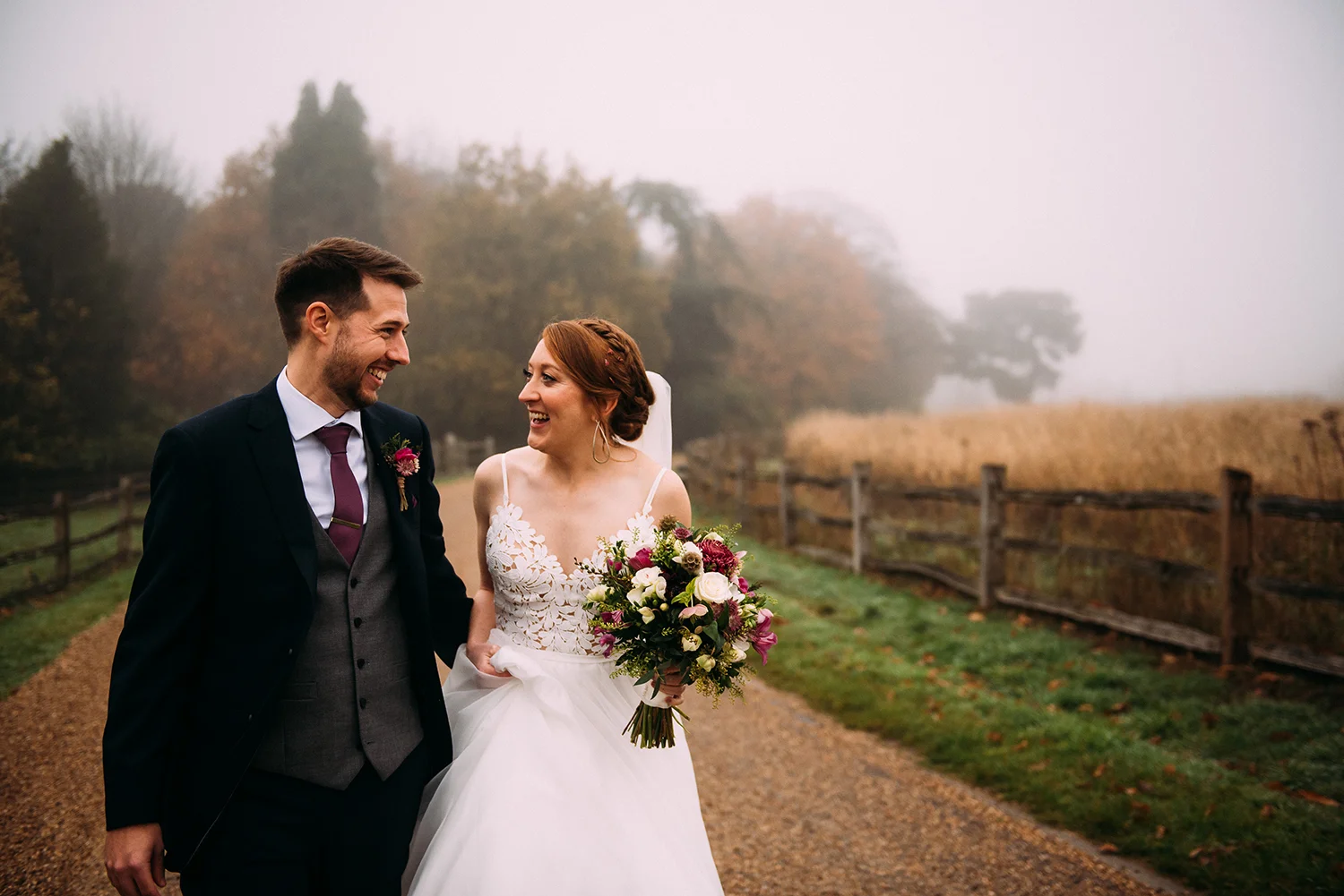 couple walking down the driving