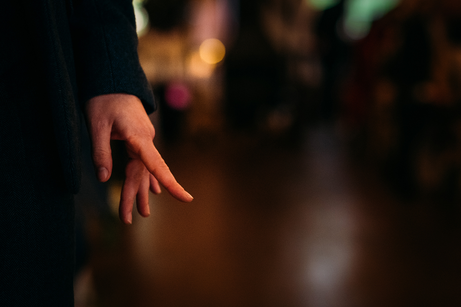 groom nervously twitching his finger