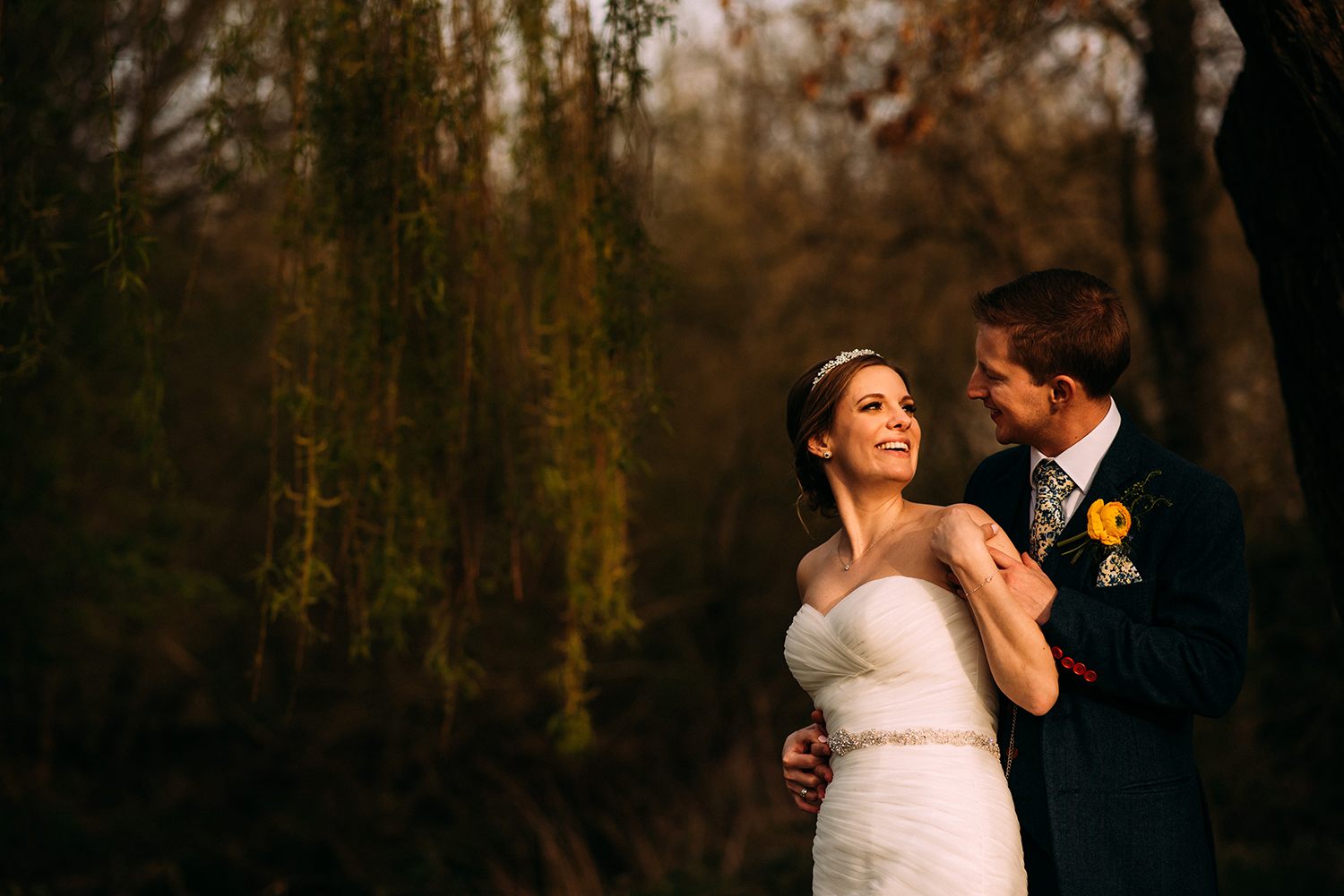 couple portrait under the weeping willow tree