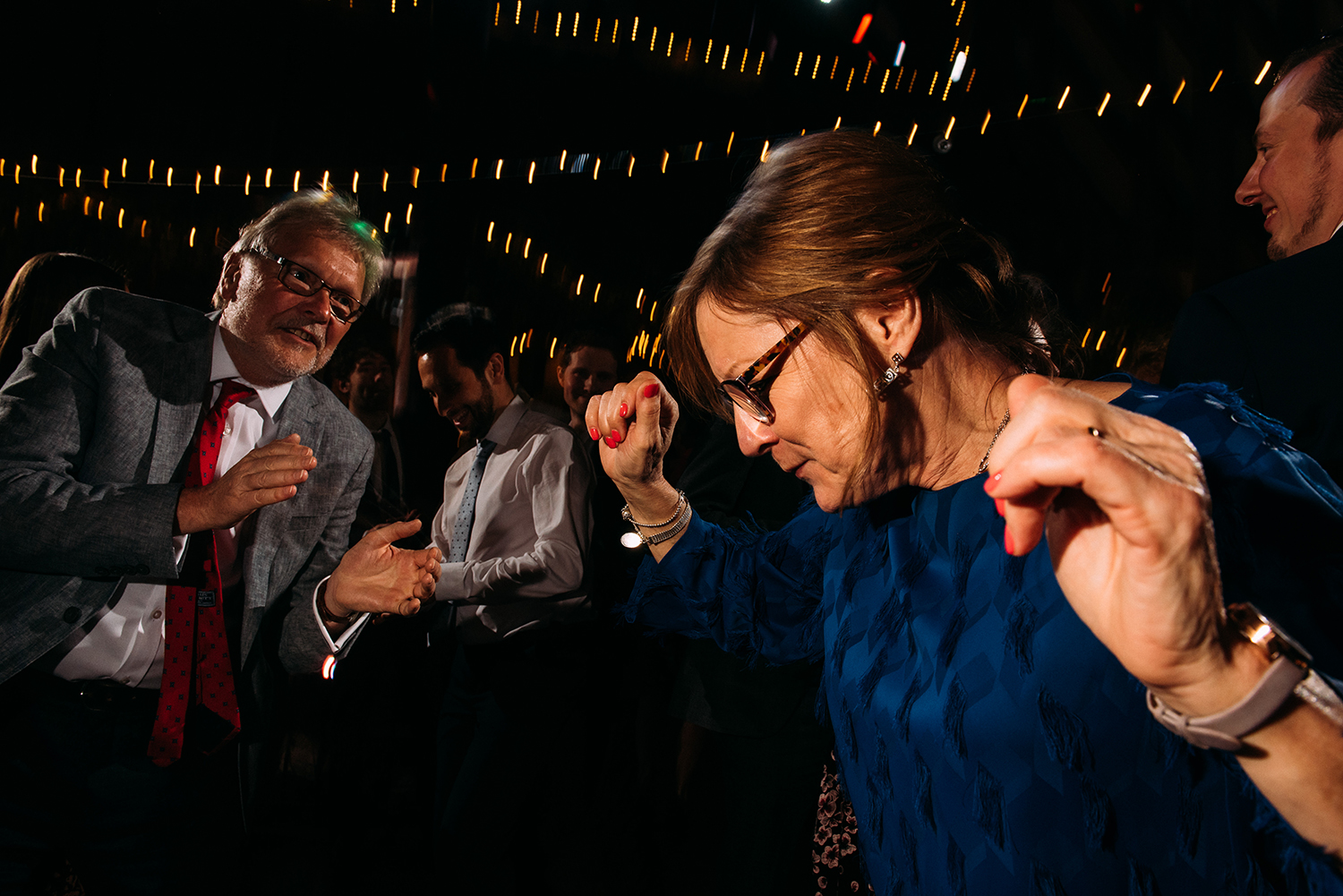 mother of the bride dancing with a friend