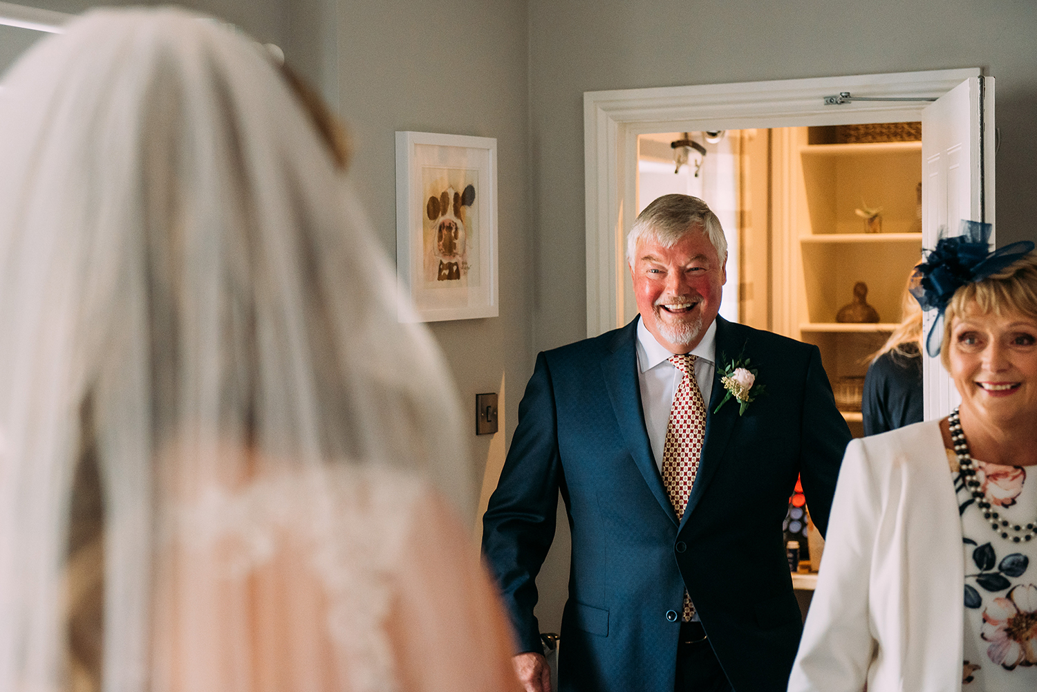 dad first see’s the bride in her dress
