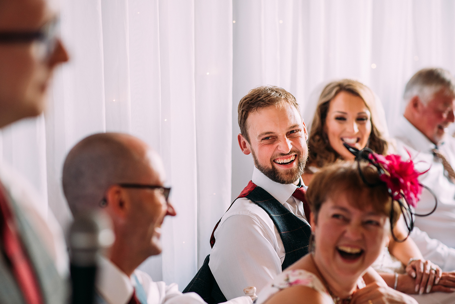 laughing during the speeches