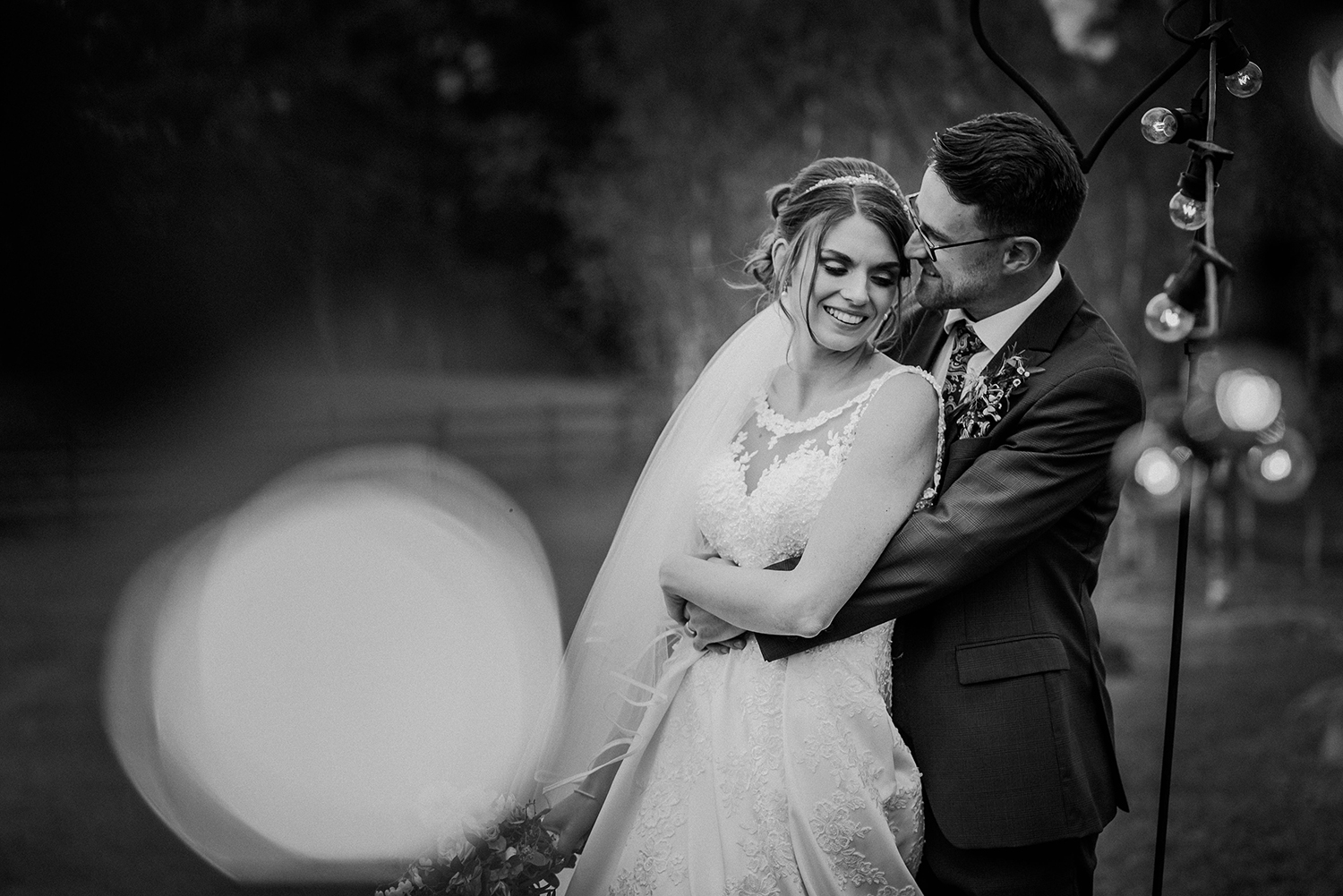 Bride and groom together at the Out barn wedding venue. BW photo