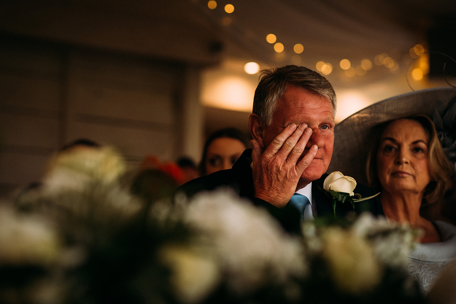 brides father wipes tears
