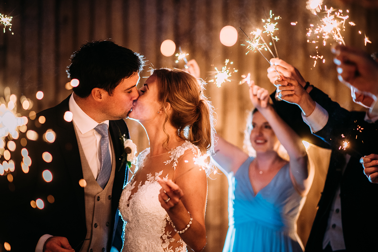 bride and groom with sparklers