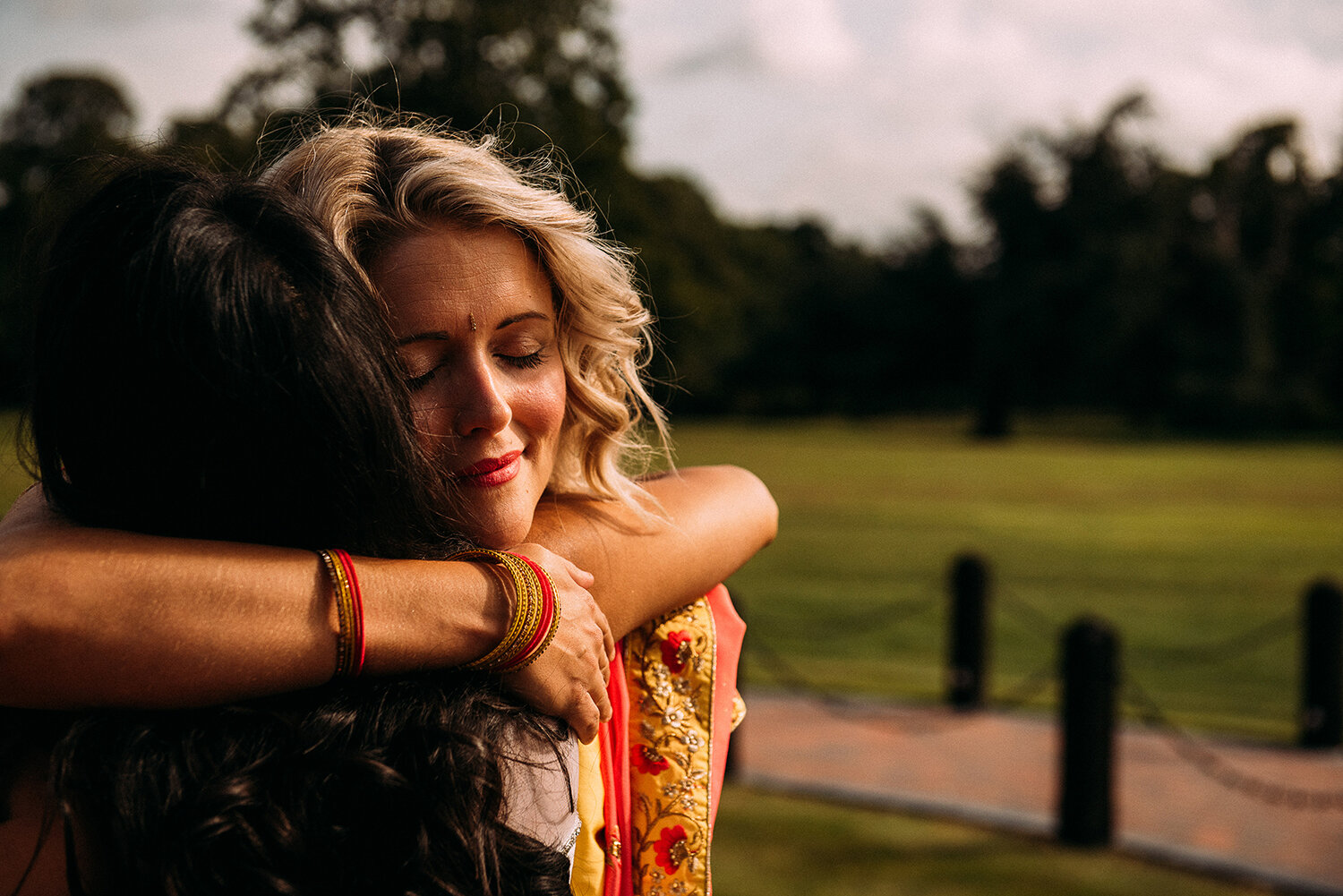  guest hugs the bride 