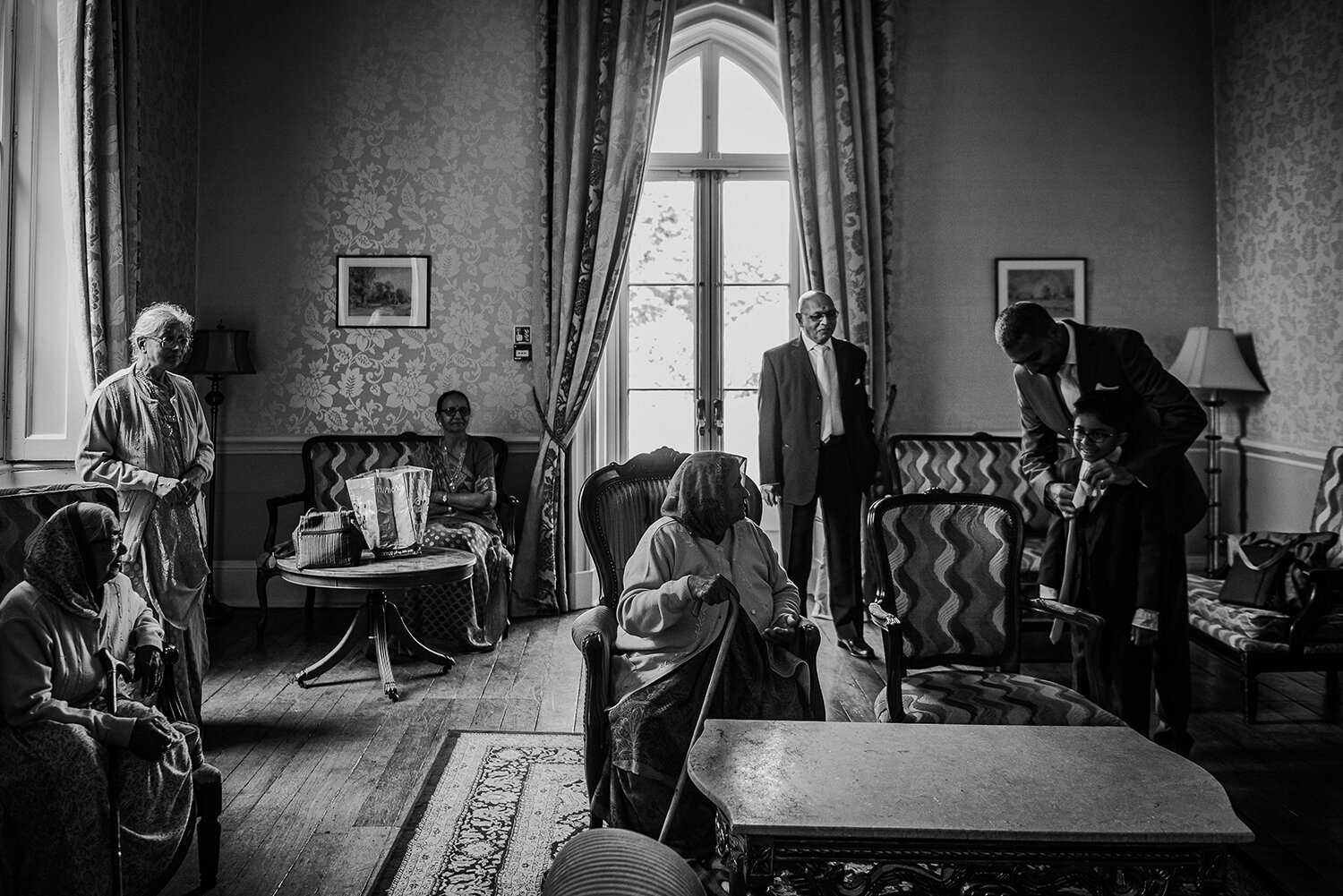  bw photo of guests in the Hughes lounge 