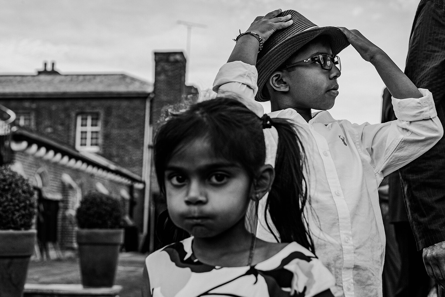  black and white photo of boy and girl looking cool 