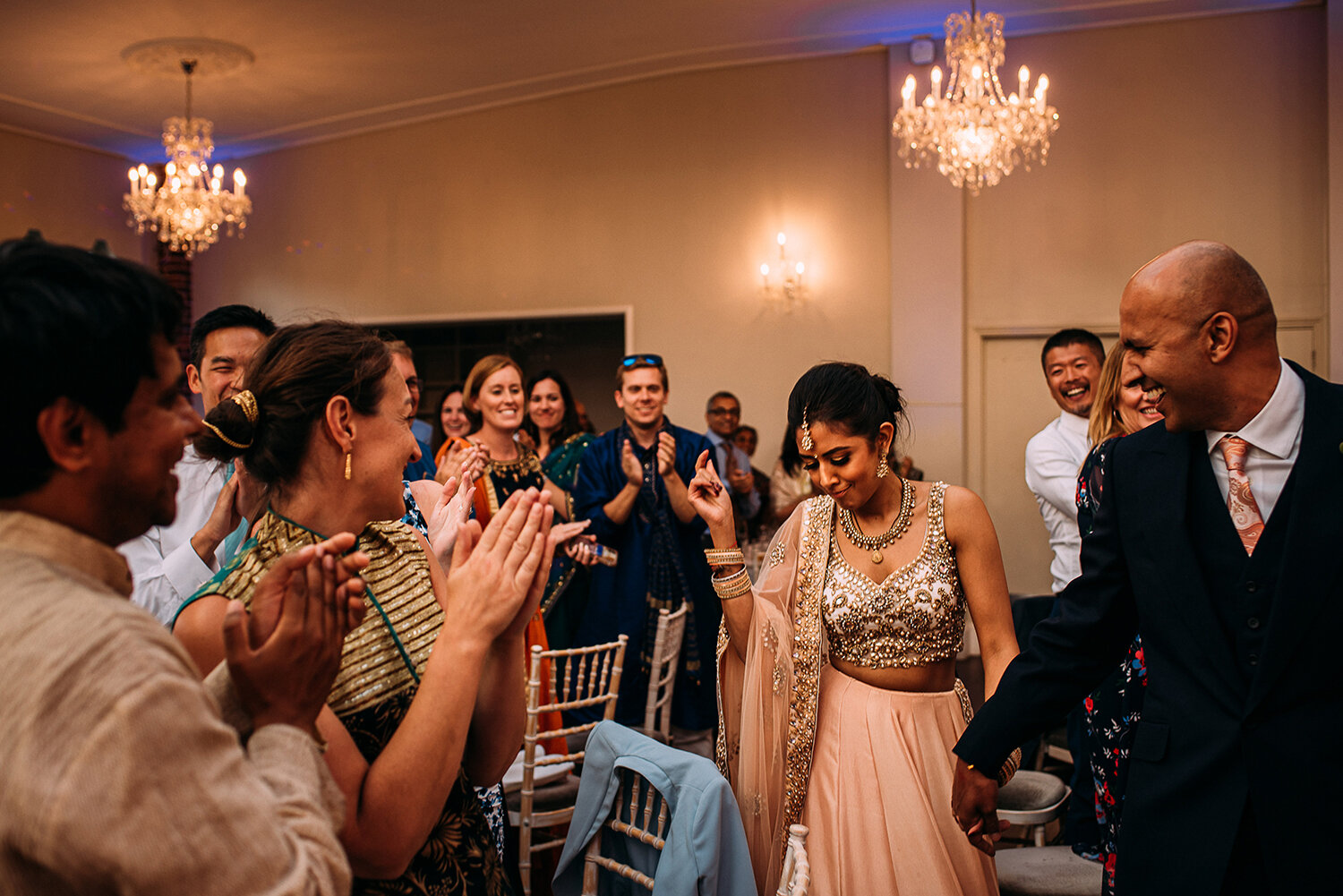  bride and groom enter the room 