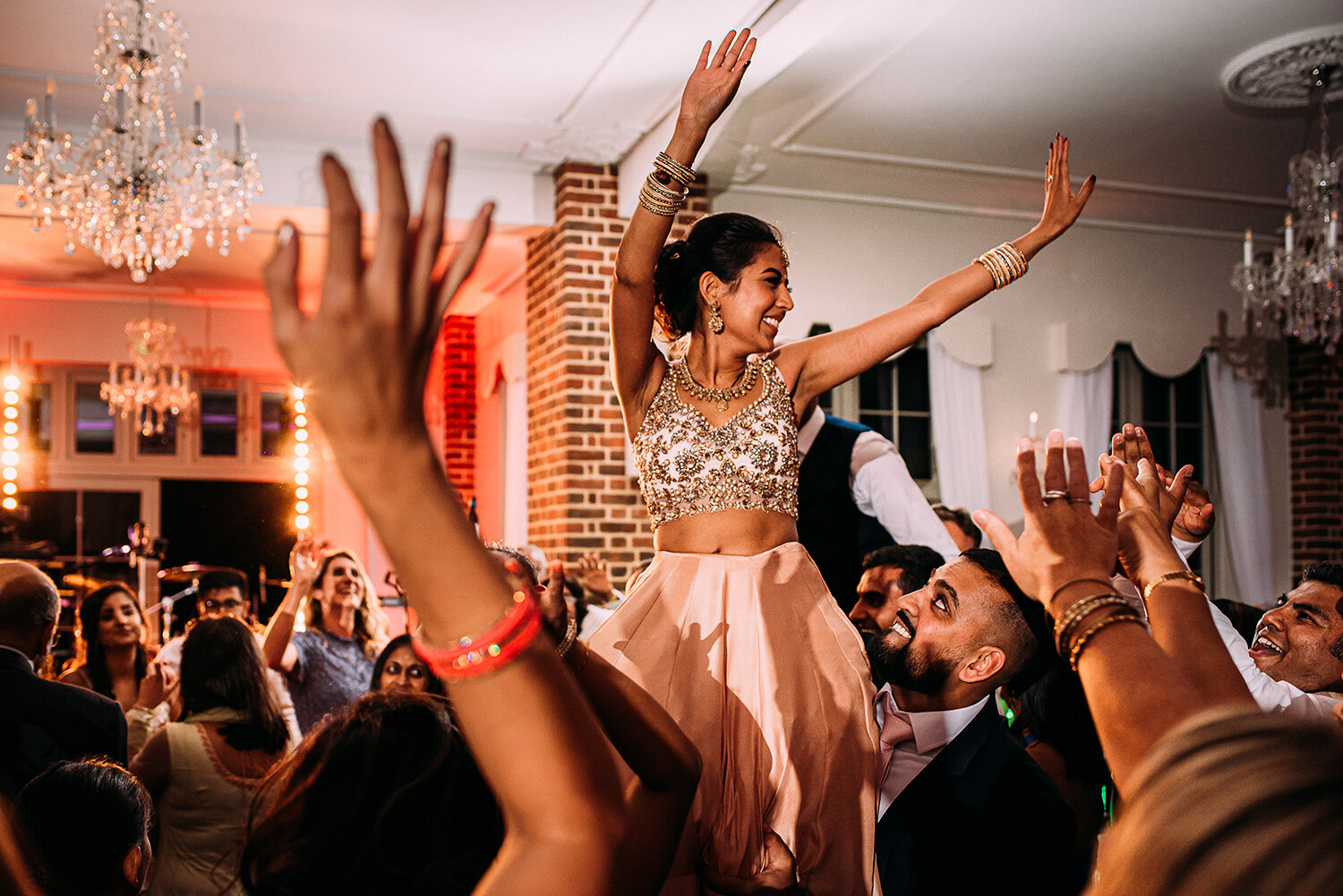  bride lifted up on the dance floor  