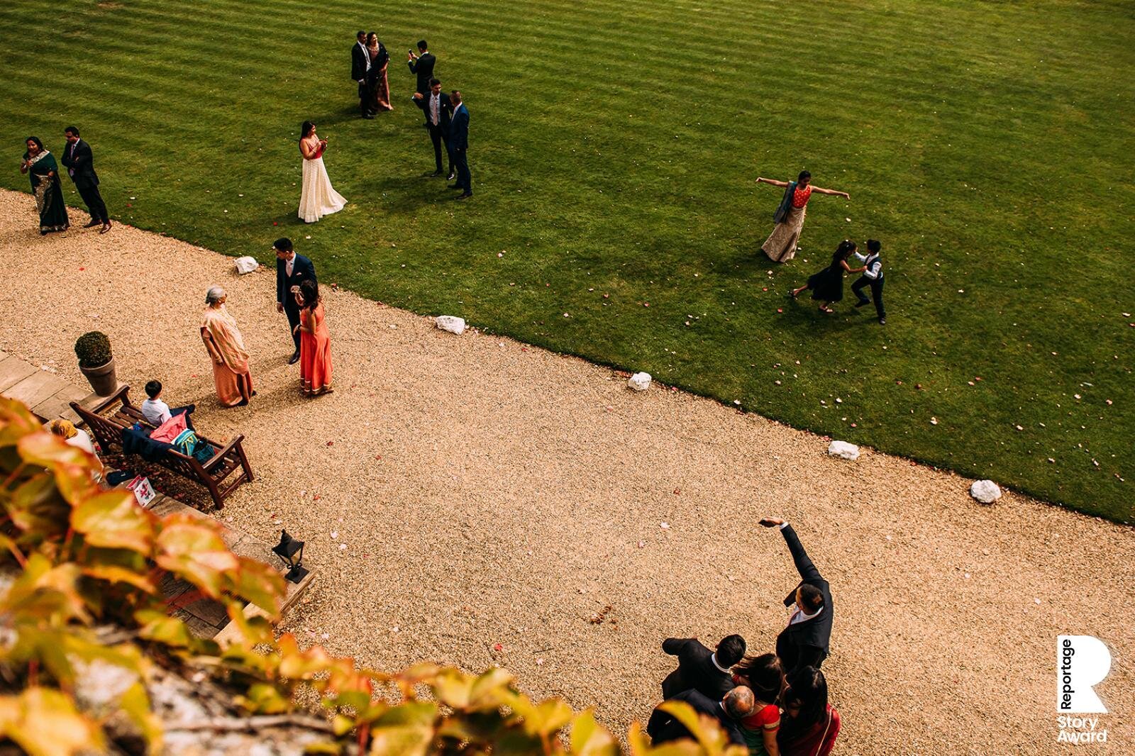  Shot from above of guests at wedding. 