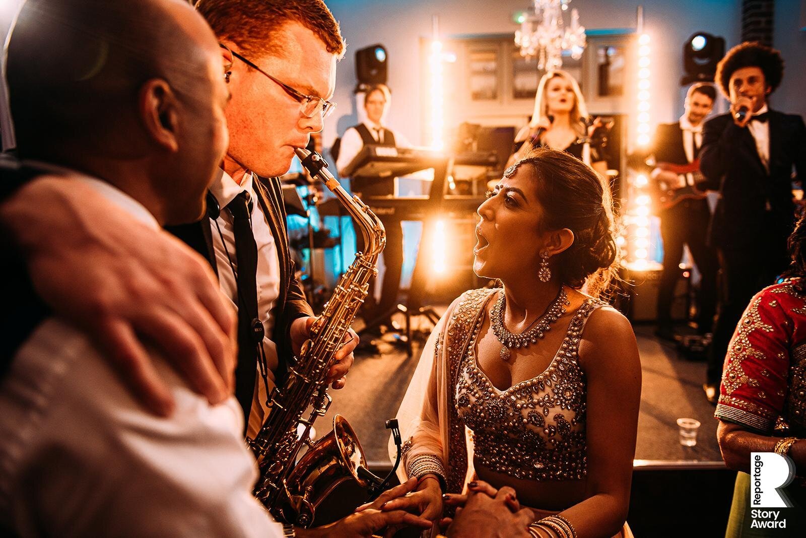  Bride dancing with the saxophone player 