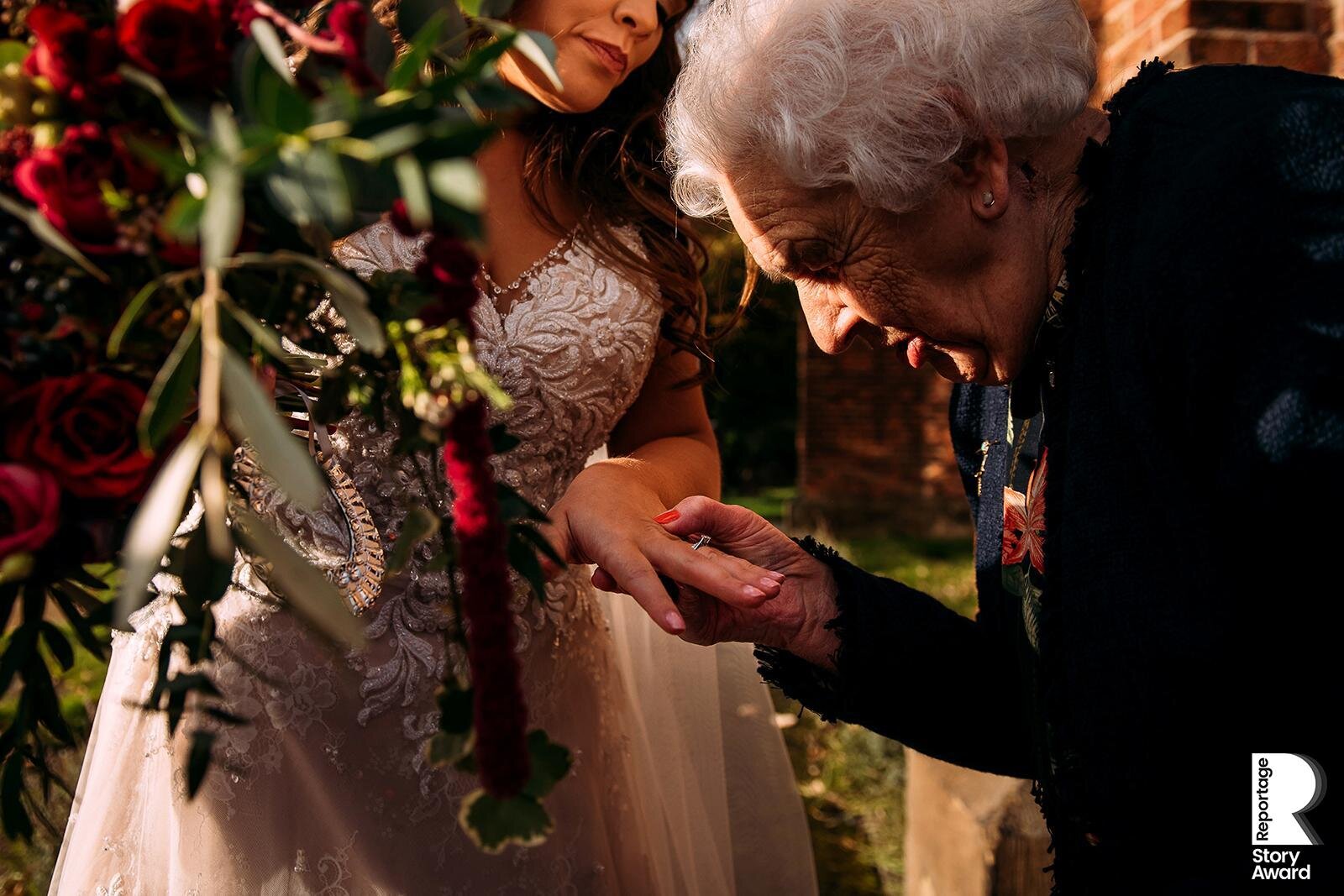  Brides nan studies her wedding ring 