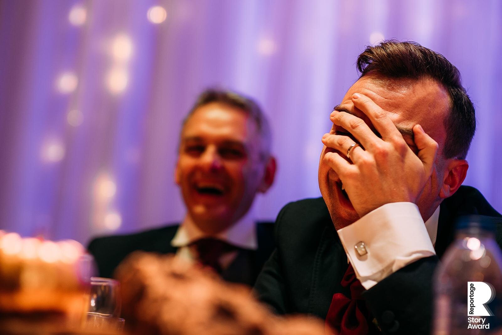  Grooms has head in hands during best man speech 