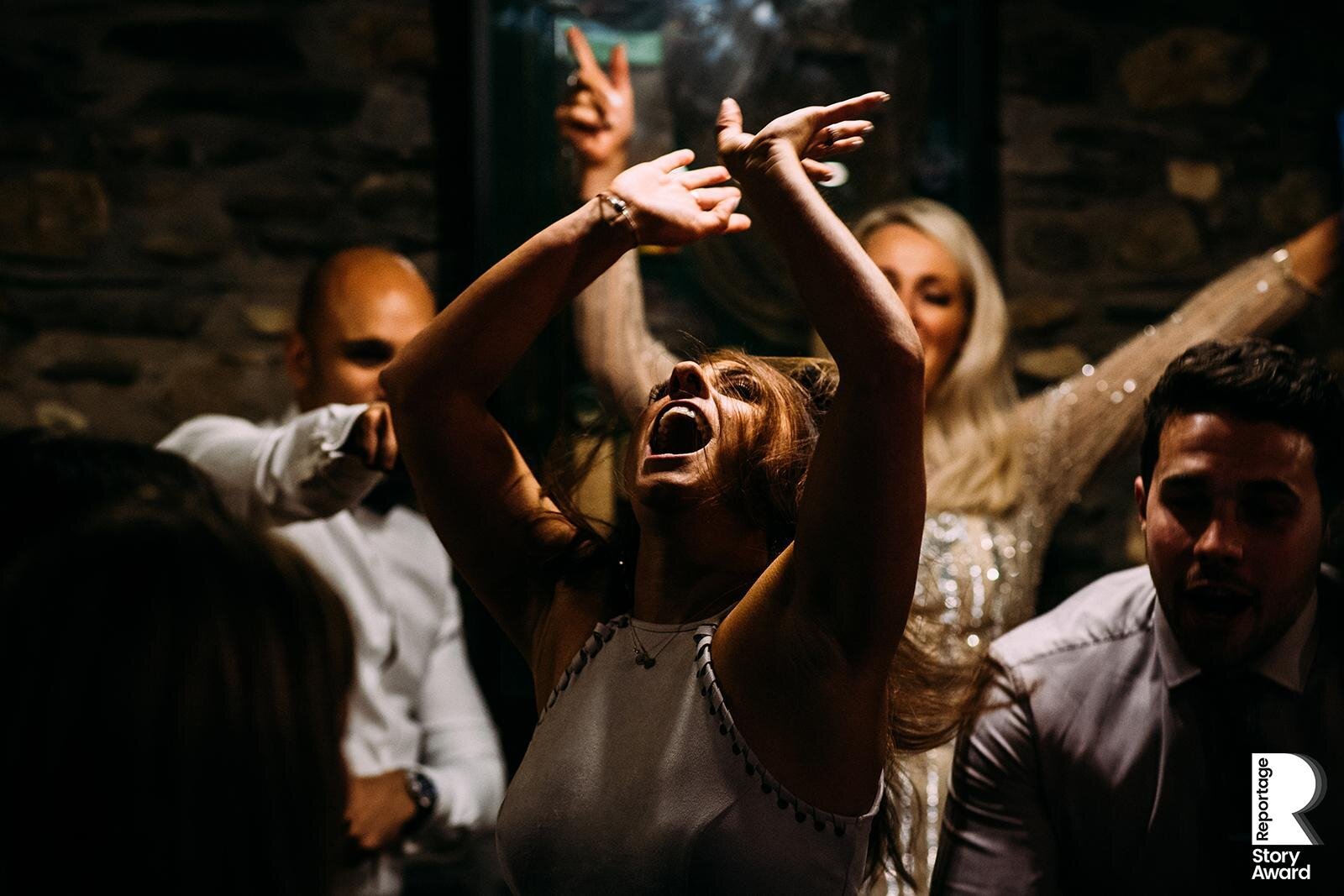  a guest dancing and singing during a ‘sing off’ 