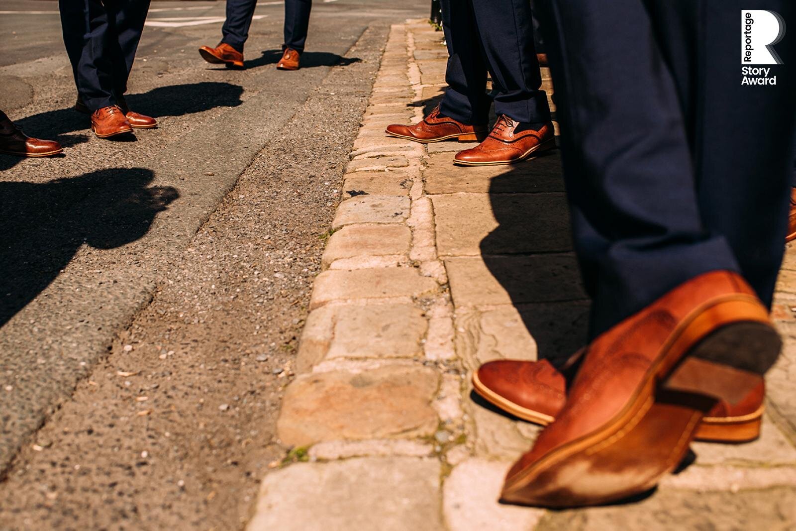  Close up of shoes, showing how the groomsmen are all standing. 