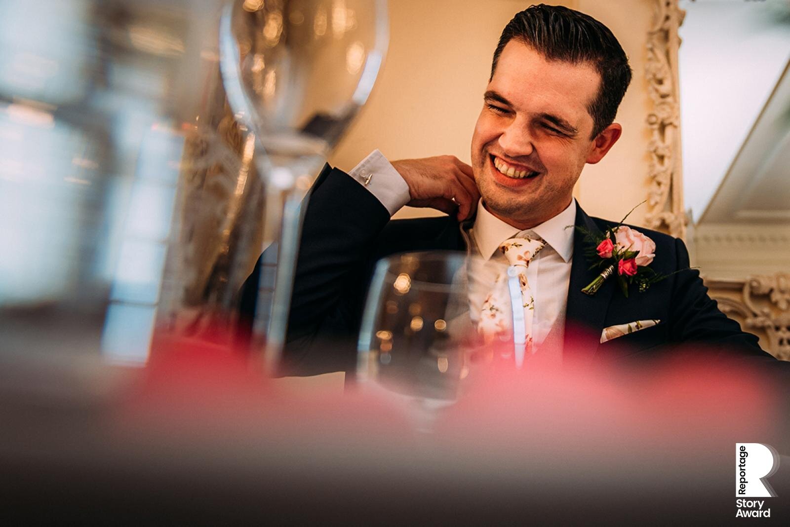  Groom looking uncomfortable during the best man speech. 