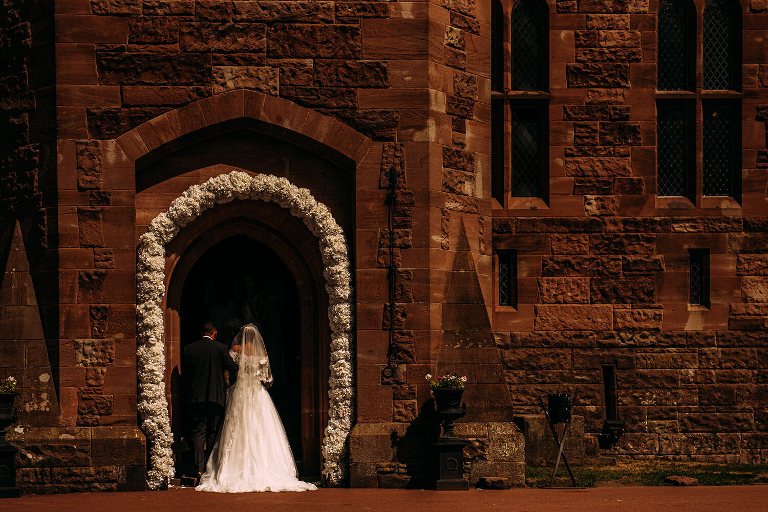  Bride and father walking into the Great Hall. 