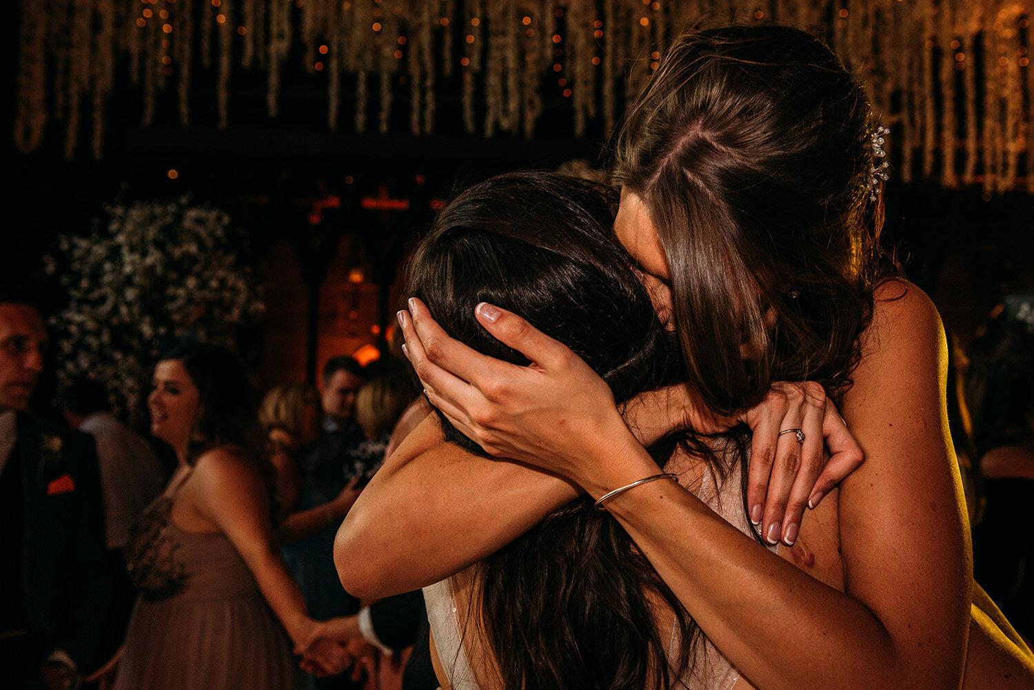  close up hug on the dance floor. 