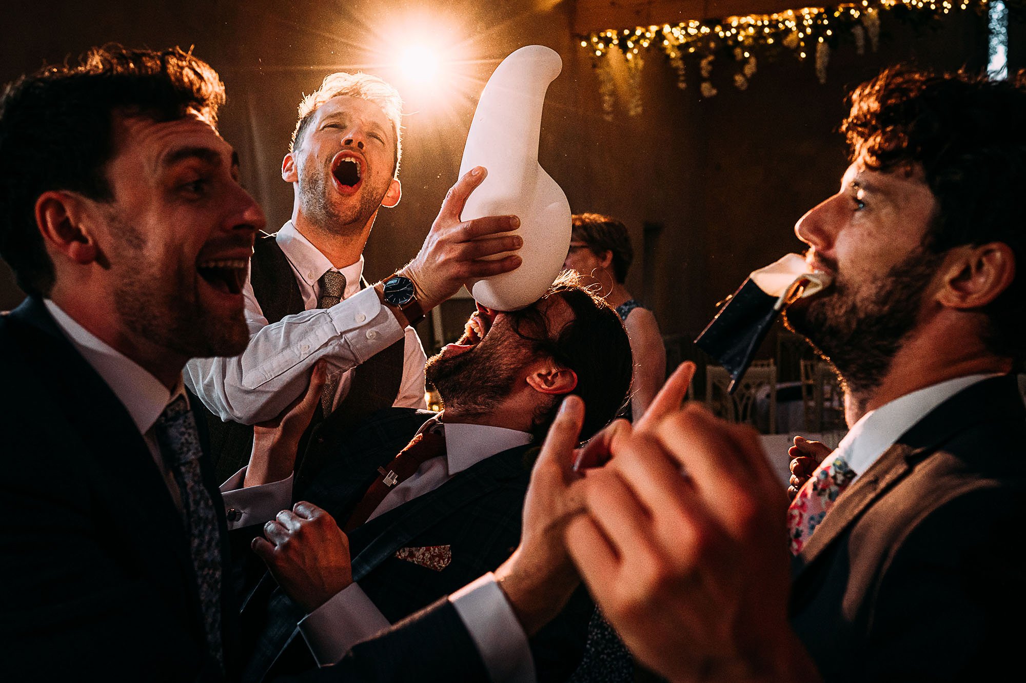  Men having fun on the dance floor. 