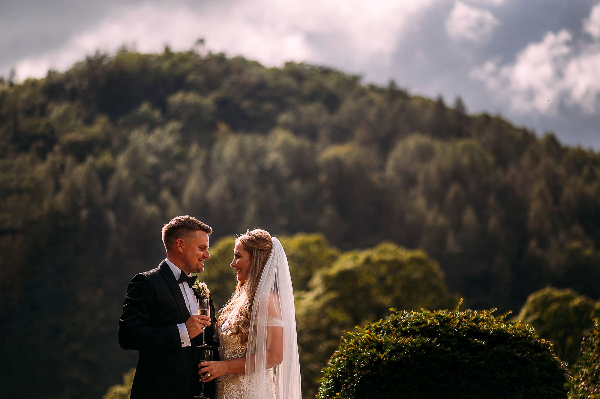  Bride and groom in front of the stunning hills at Whitewell. 