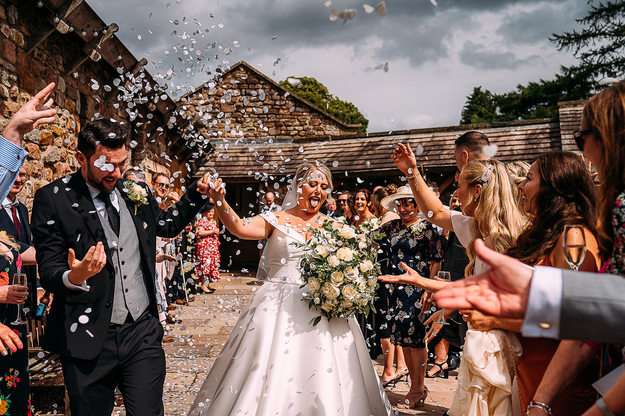  Confetti shot at Browsholme, bride has some stuck on her tongue. 