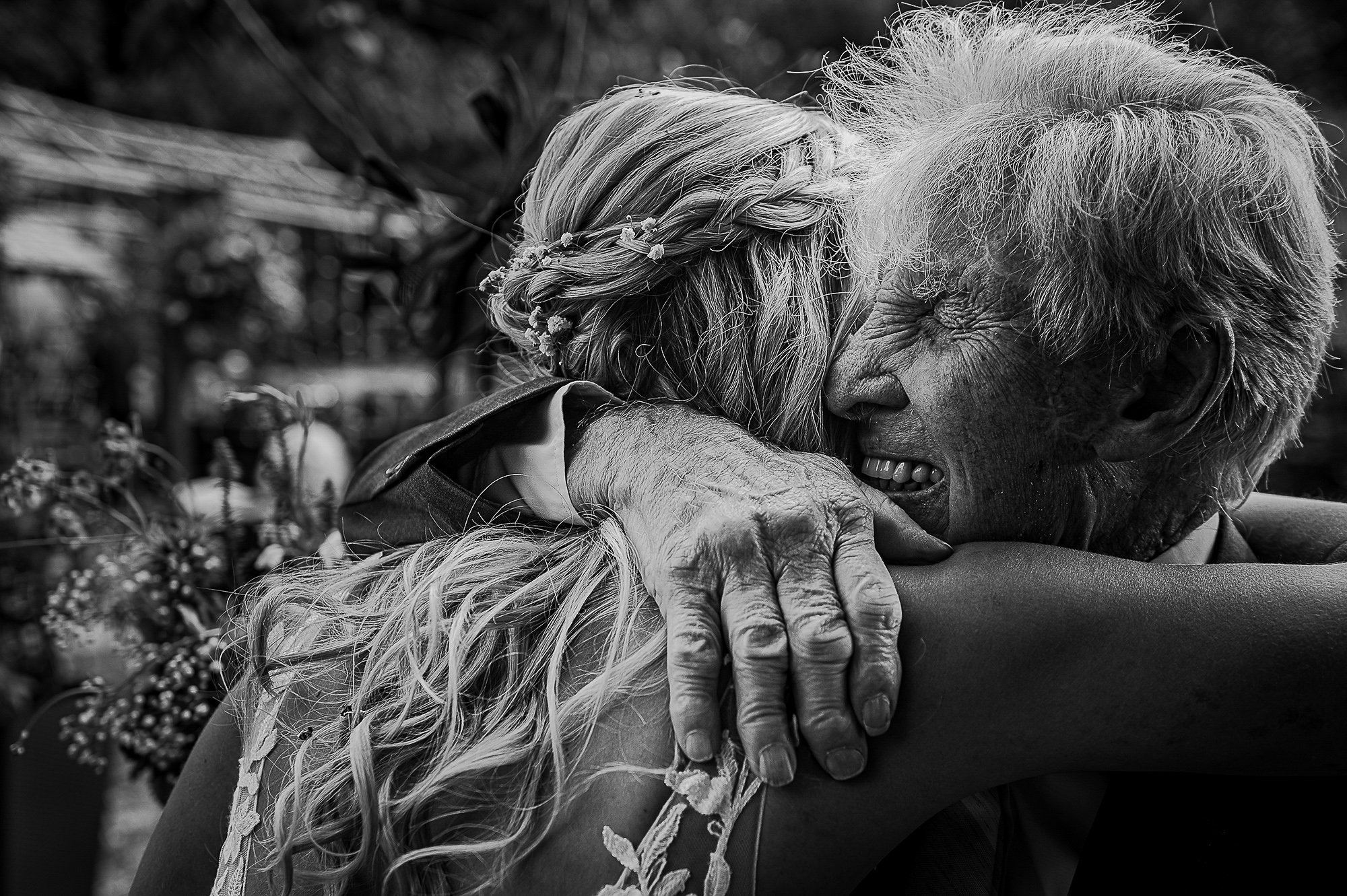  Bride gives her grandfather an emotional hug. 