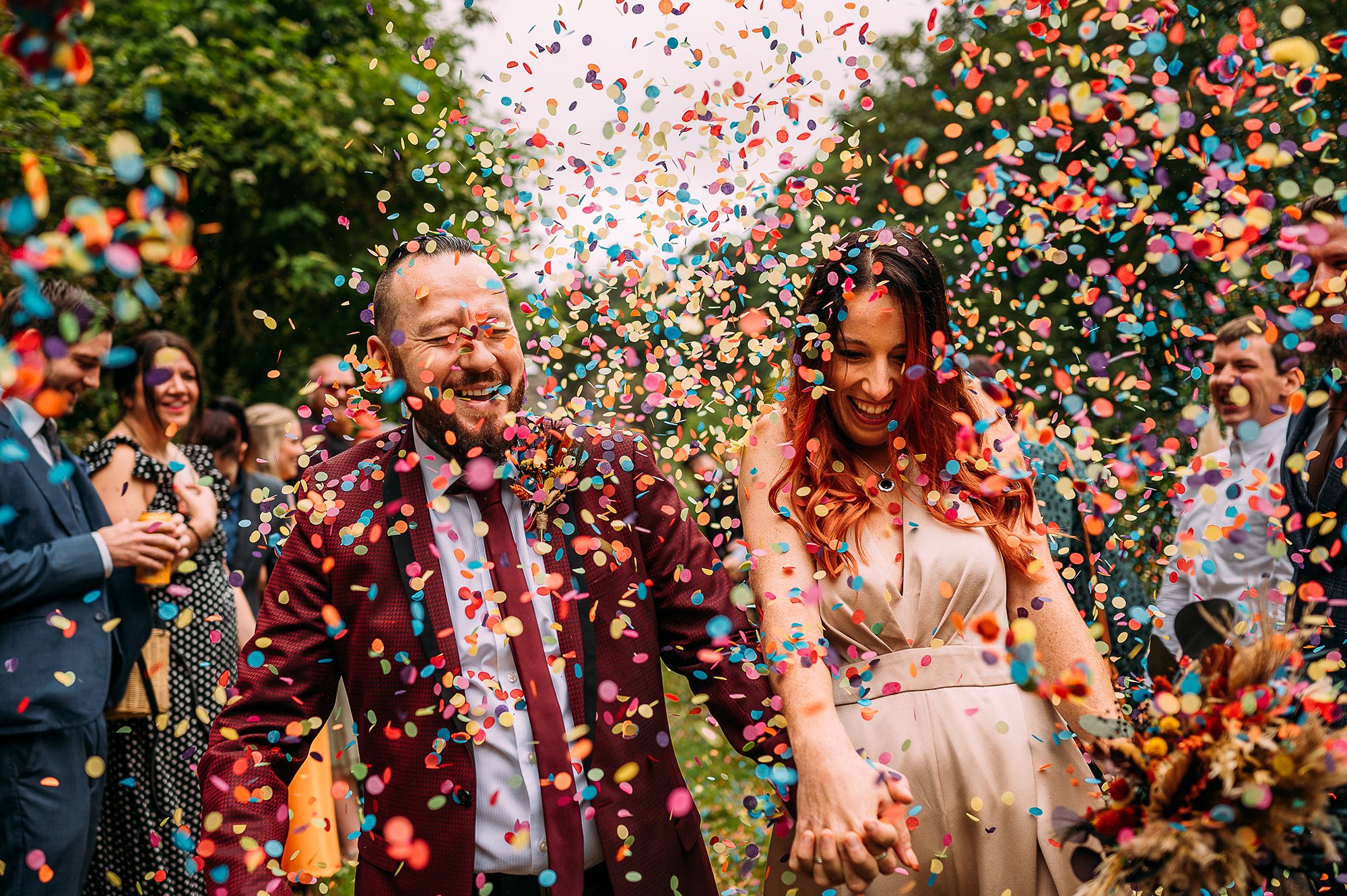  Bride and groom and masses of confetti 