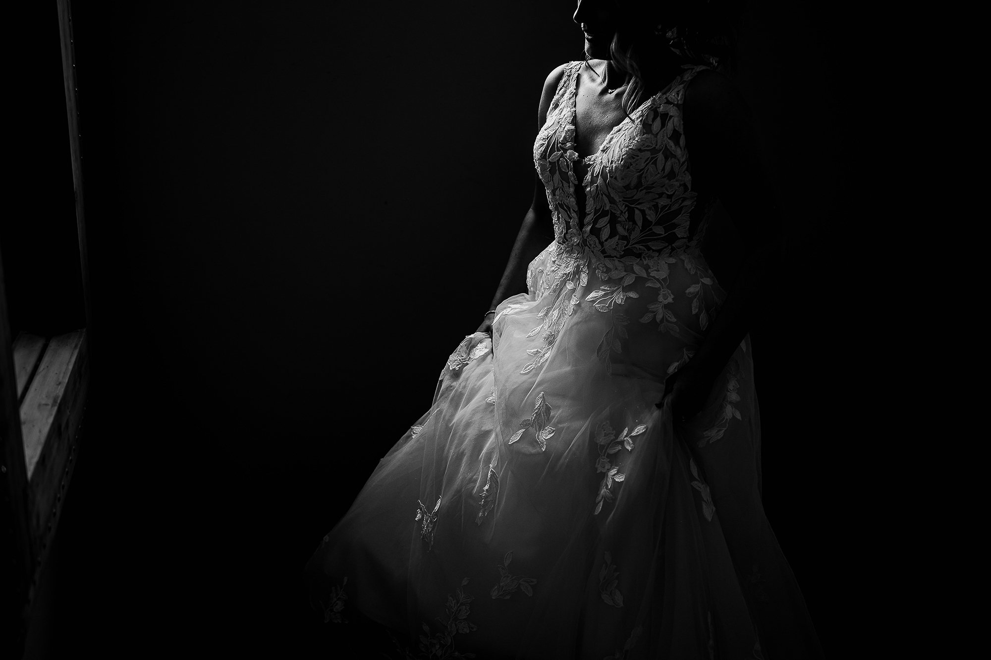  Simple black and white detail shot of brides dress in nice light. 