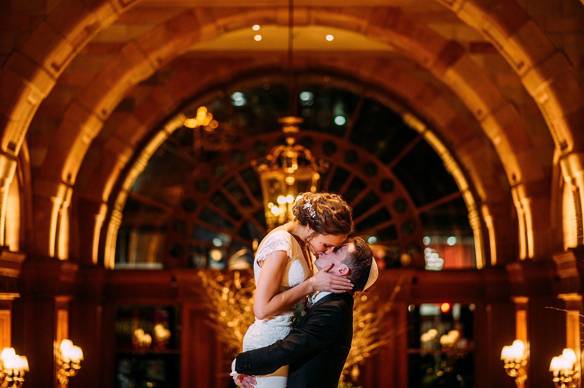  Bride and groom kiss at the Landmark hotel in London. 