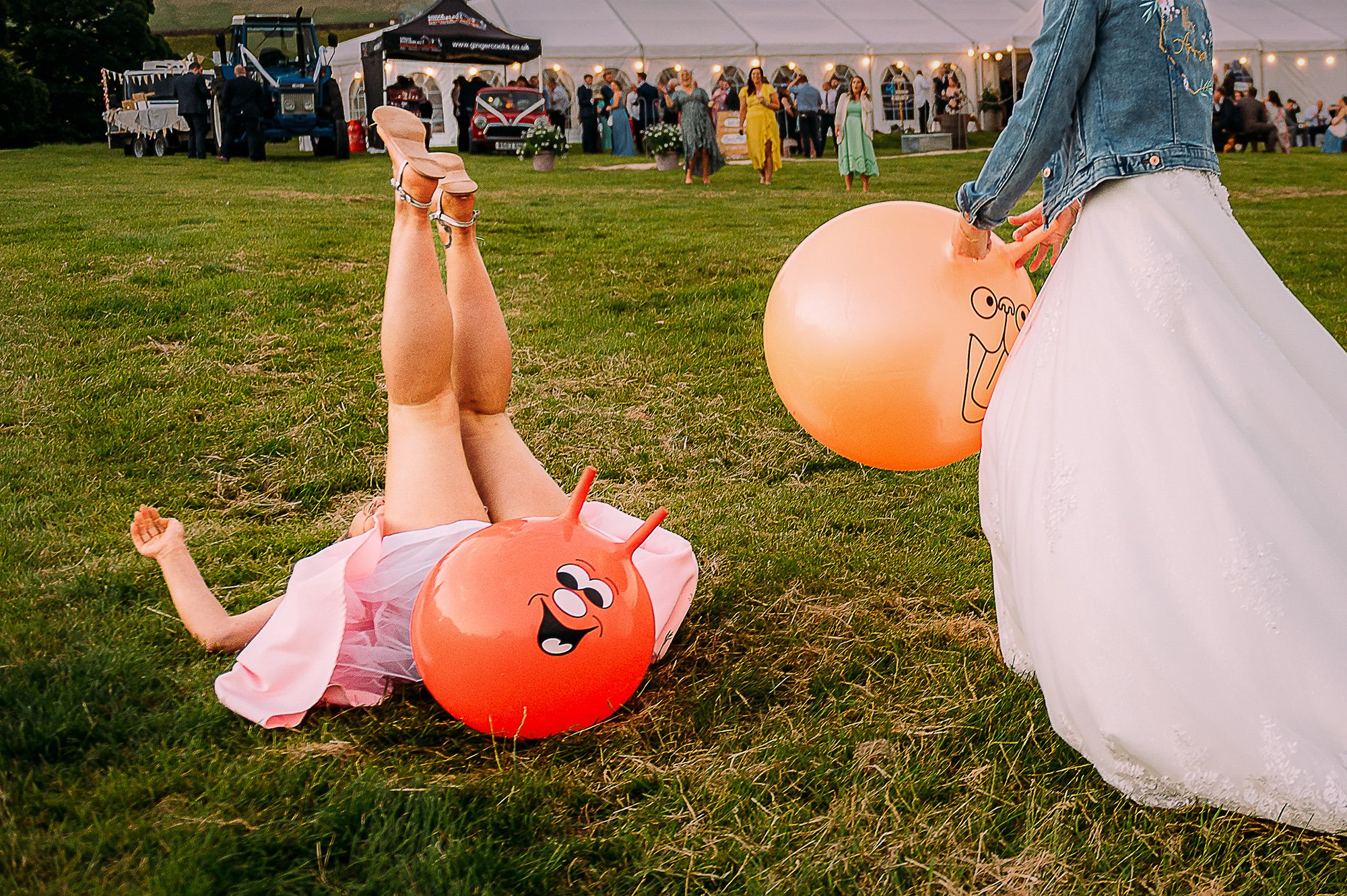  Guest falls off space hopper, smiley face on space hopper covers her privates. 