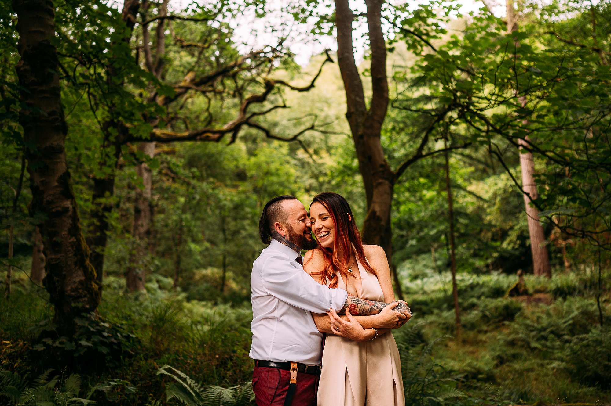  Bride and groom couple portrait in the woods. 
