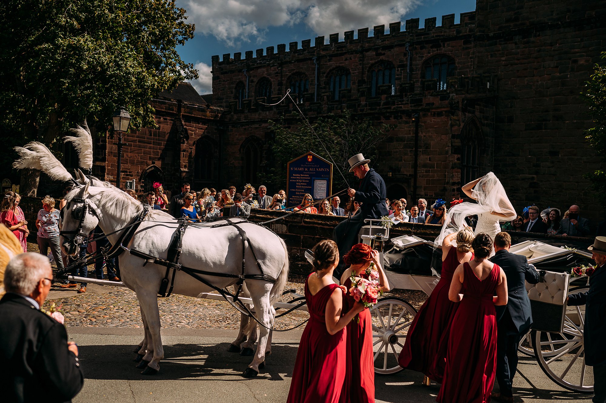  Bride mounting a horse and carriage to leave church. 