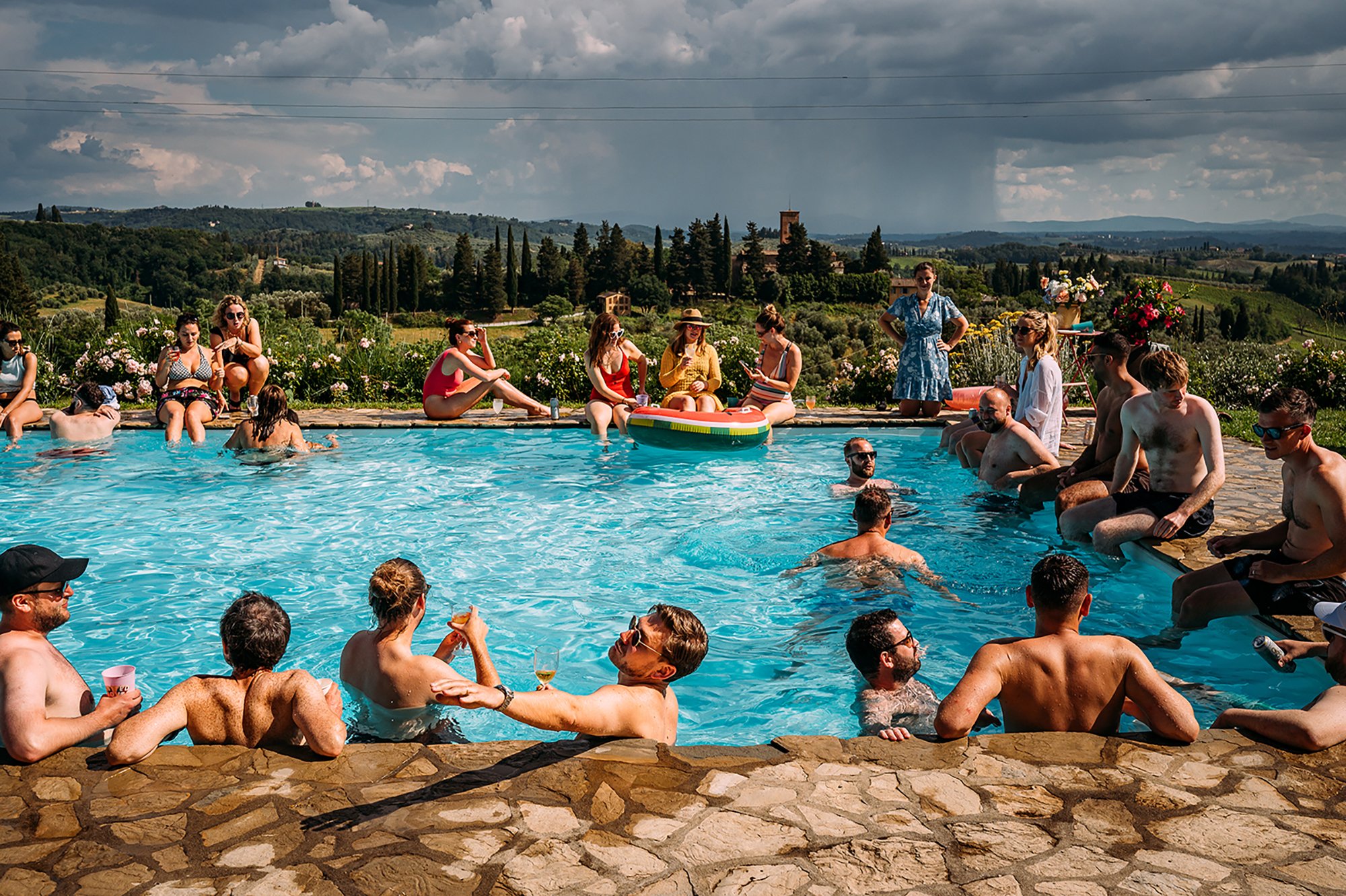  guests at destination wedding pool party 