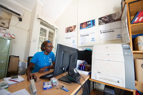 Cathy Wachiaya at work, Public Information Associate, UNHCR Sub-Office, Kakuma