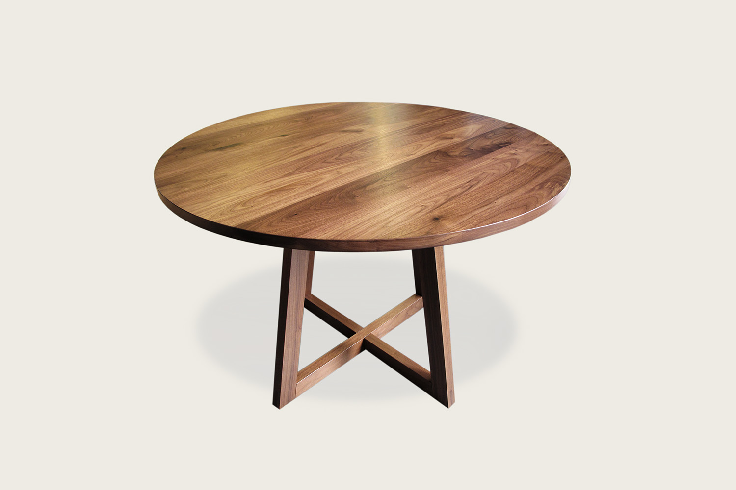 Finn Round Pedestal Dining Table in solid walnut - Speke Klein