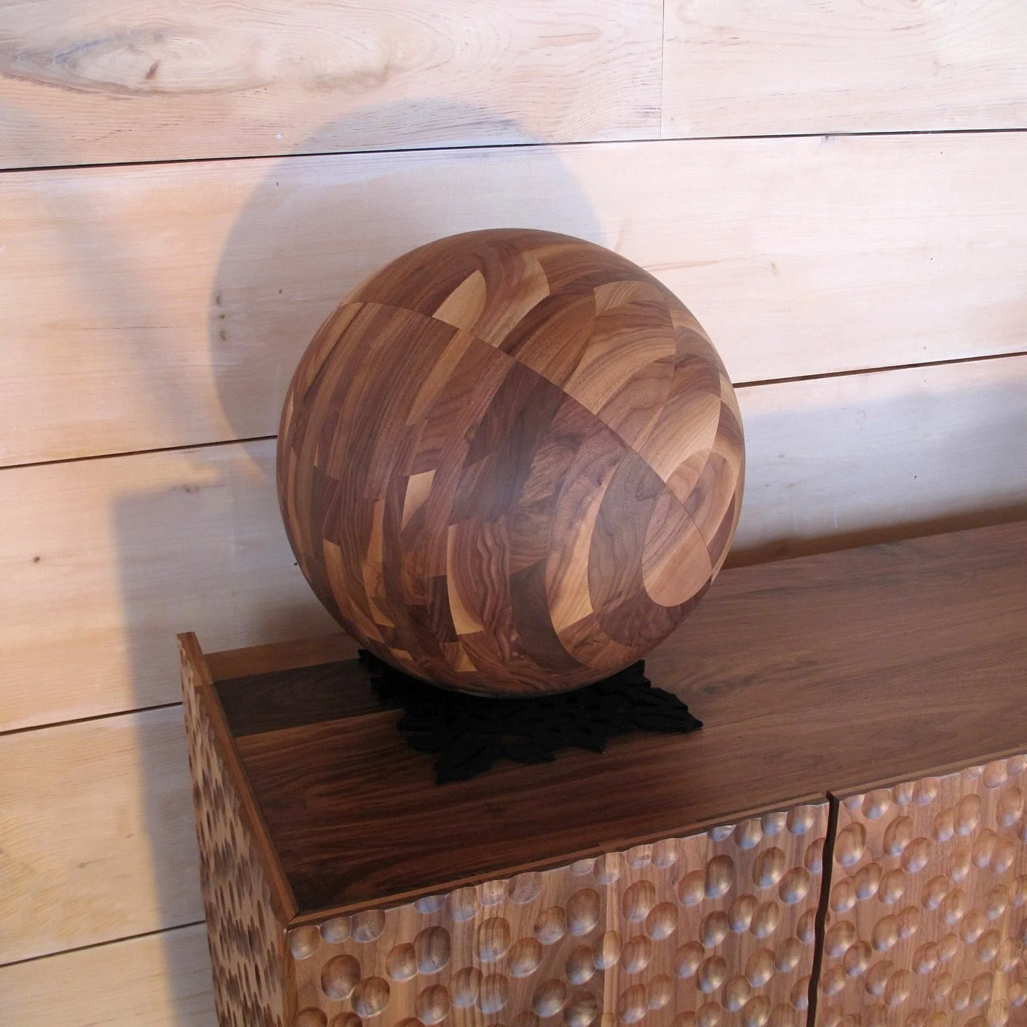 Solid walnut sphere&hellip;The simple shape shows off the colour variations that make walnut so beautiful. Shown with our walnut Flow Credenza. 
 
In woodworking, offcuts or wood scrap can pile up quickly. Many pieces seem too large to discard, but m