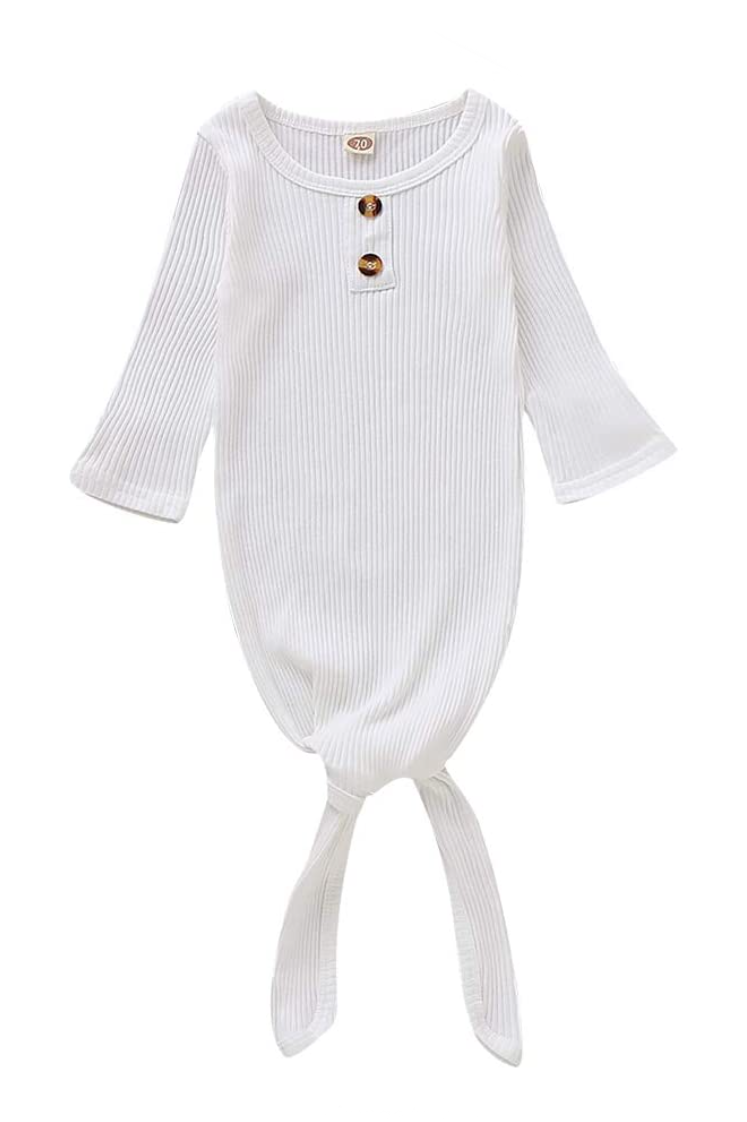 white baby gown with buttons newborn photographer.png