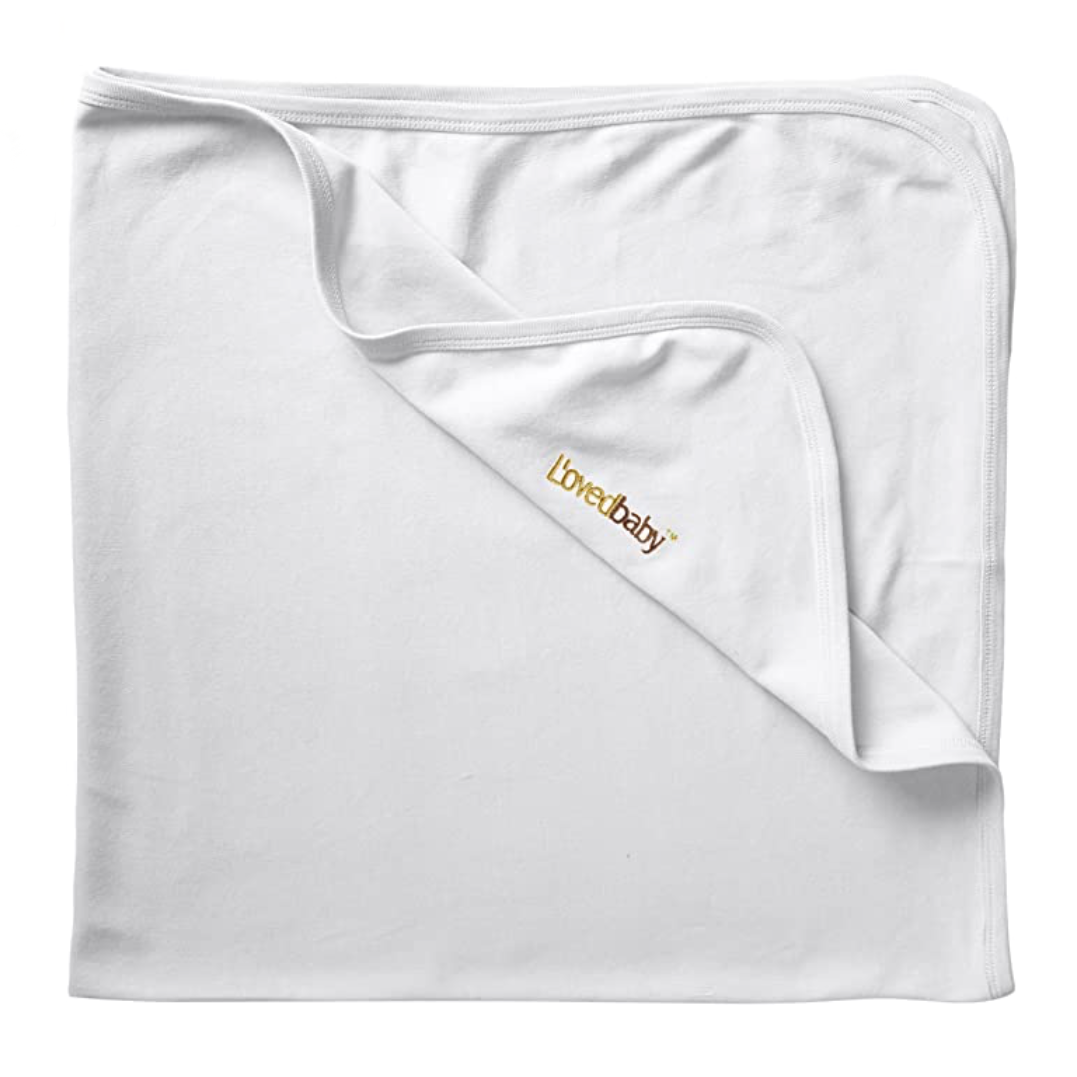 loved baby white swaddle blanket newborn photographer.png