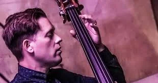 Janisch Holds Down Bass and Business