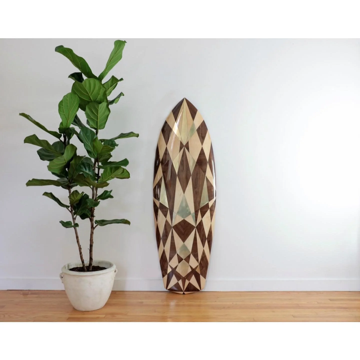 An art piece we did (fully rideable) a while back! Partnered up with surfboard shaper extrodinaire @nine_lights to get it just right! Would love to do another version of one of these. Whose down? #surf #surfboard #wave #shaper #woodboard