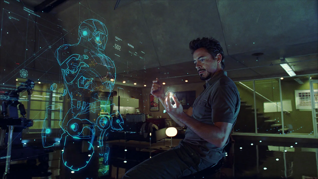 Robert Downey Jr. uses direct manipulation on a volumetric projection.