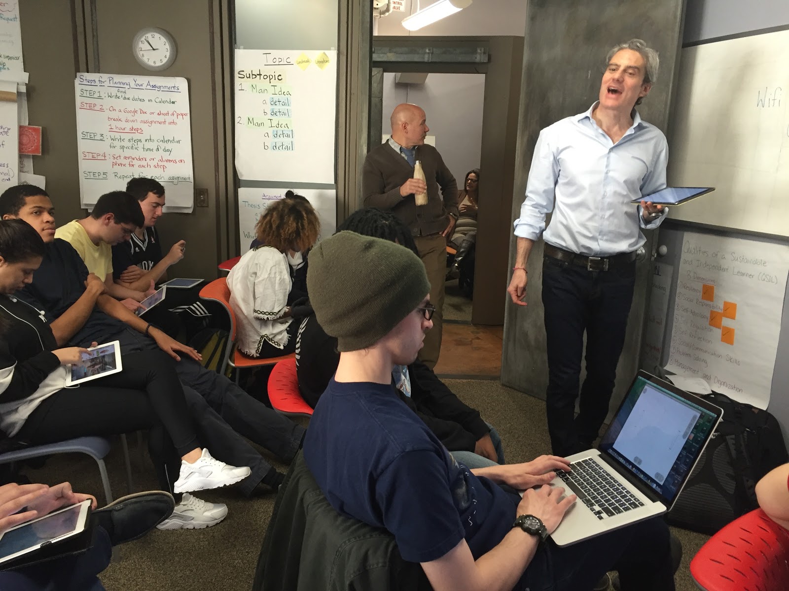 Ready CEO David and John Civita, Director of Winstons Transitions (background) build Pong with students.