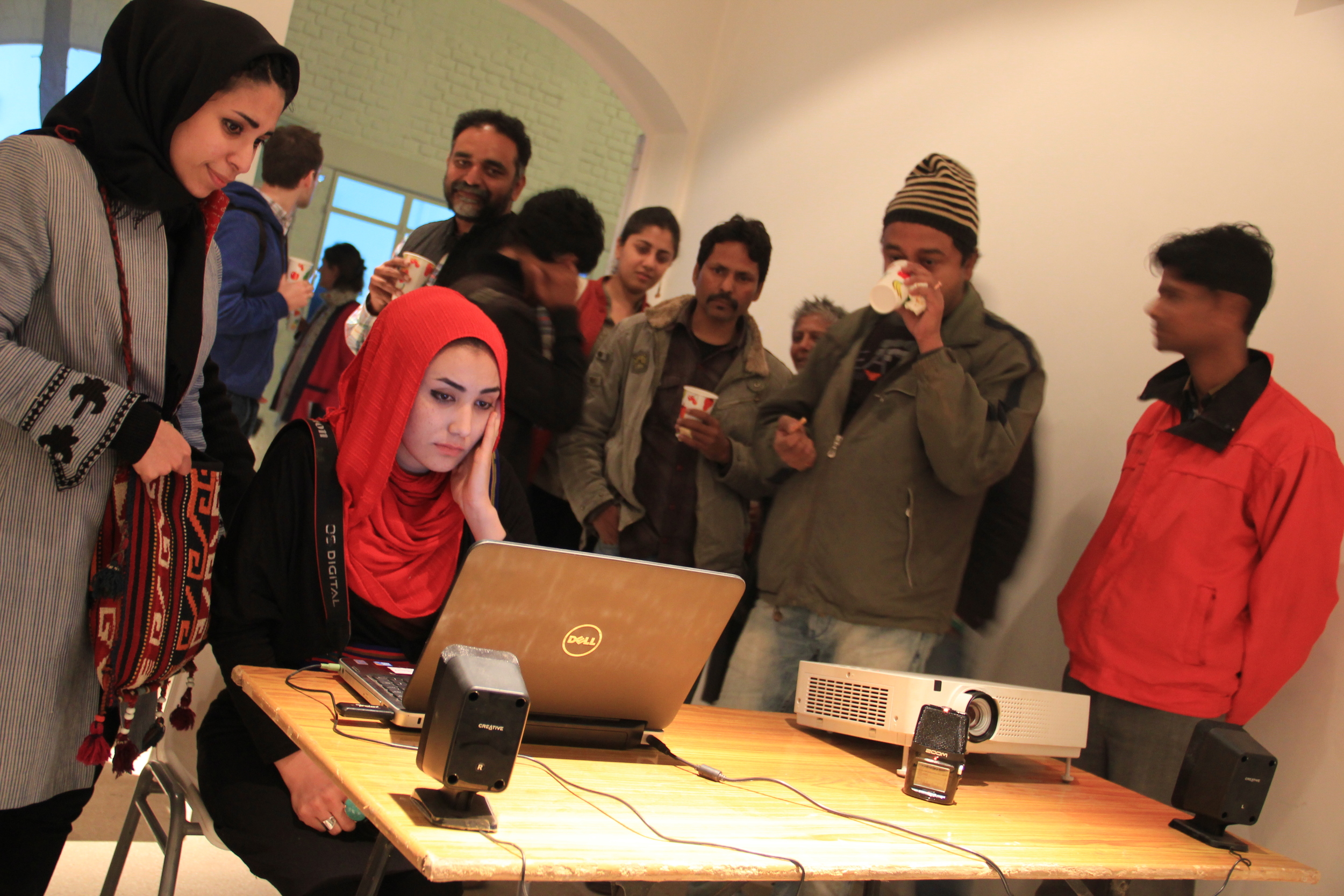  Exhibition view of visitors participating in Rabbya Naseer and Hurmat Ul Ain's event,&nbsp; Cross Connection  (2013). Photograph by Tenzing Sonam.&nbsp; 