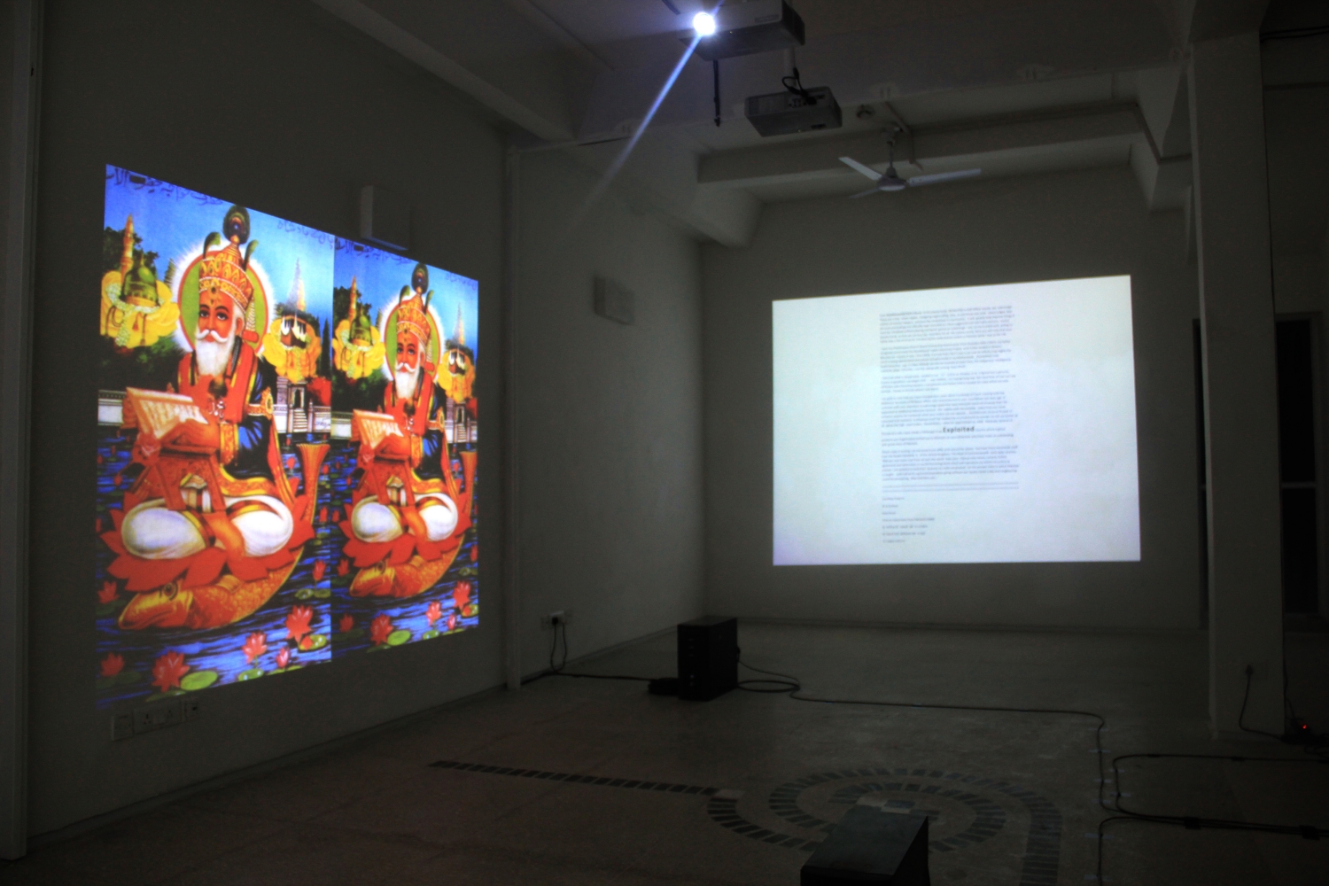  Exhibition view, to the left is Mehreen Murtaza's  This Film Should Be Played Loud &nbsp;(2012) and Iqbal Geoffrey's  The Written Versus the Art Writ ( 2013). Photograph by Sadia Shirazi.&nbsp; 